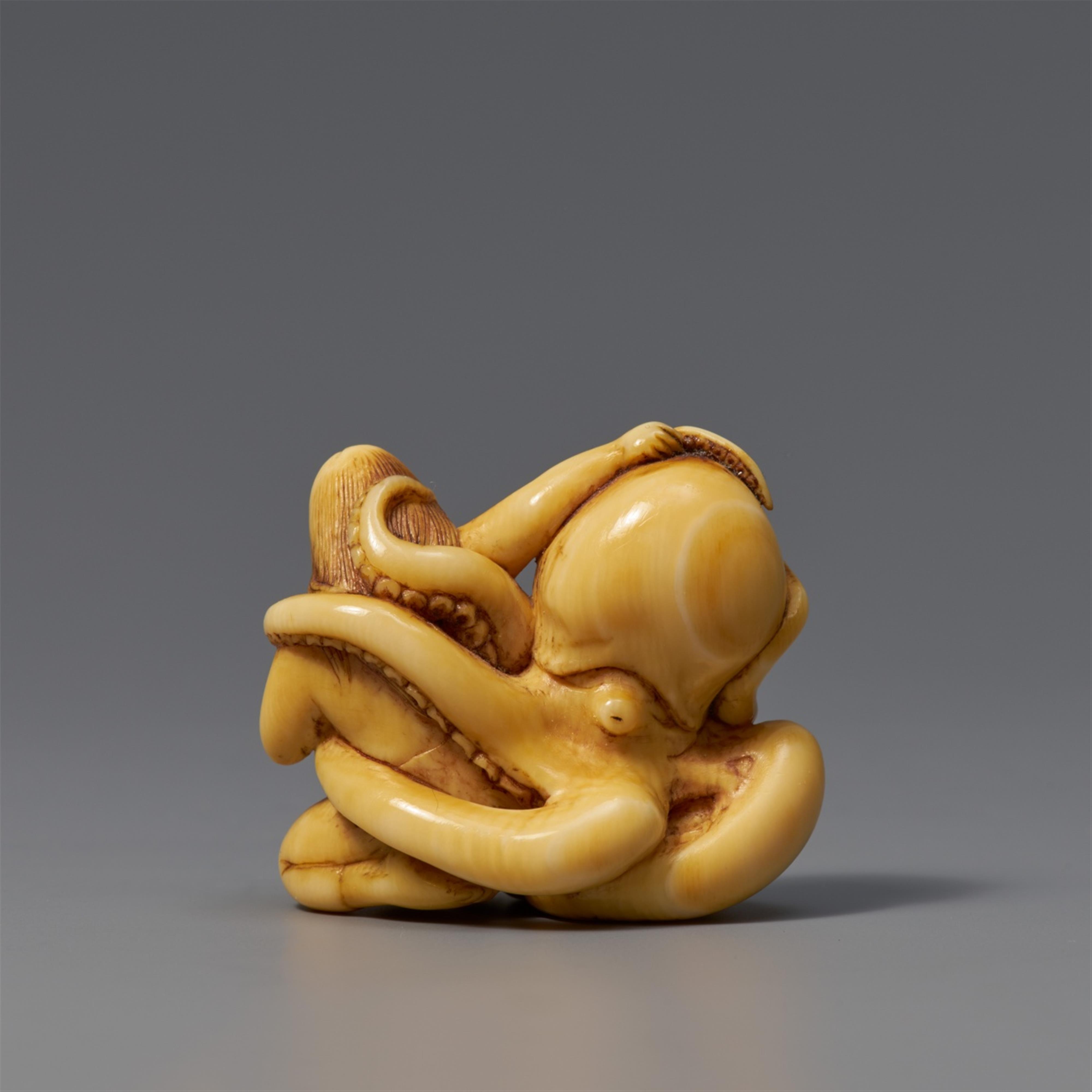 An ivory shunga netsuke of an awabi diver and octopus in amorous embrace. Early 19th century - image-2