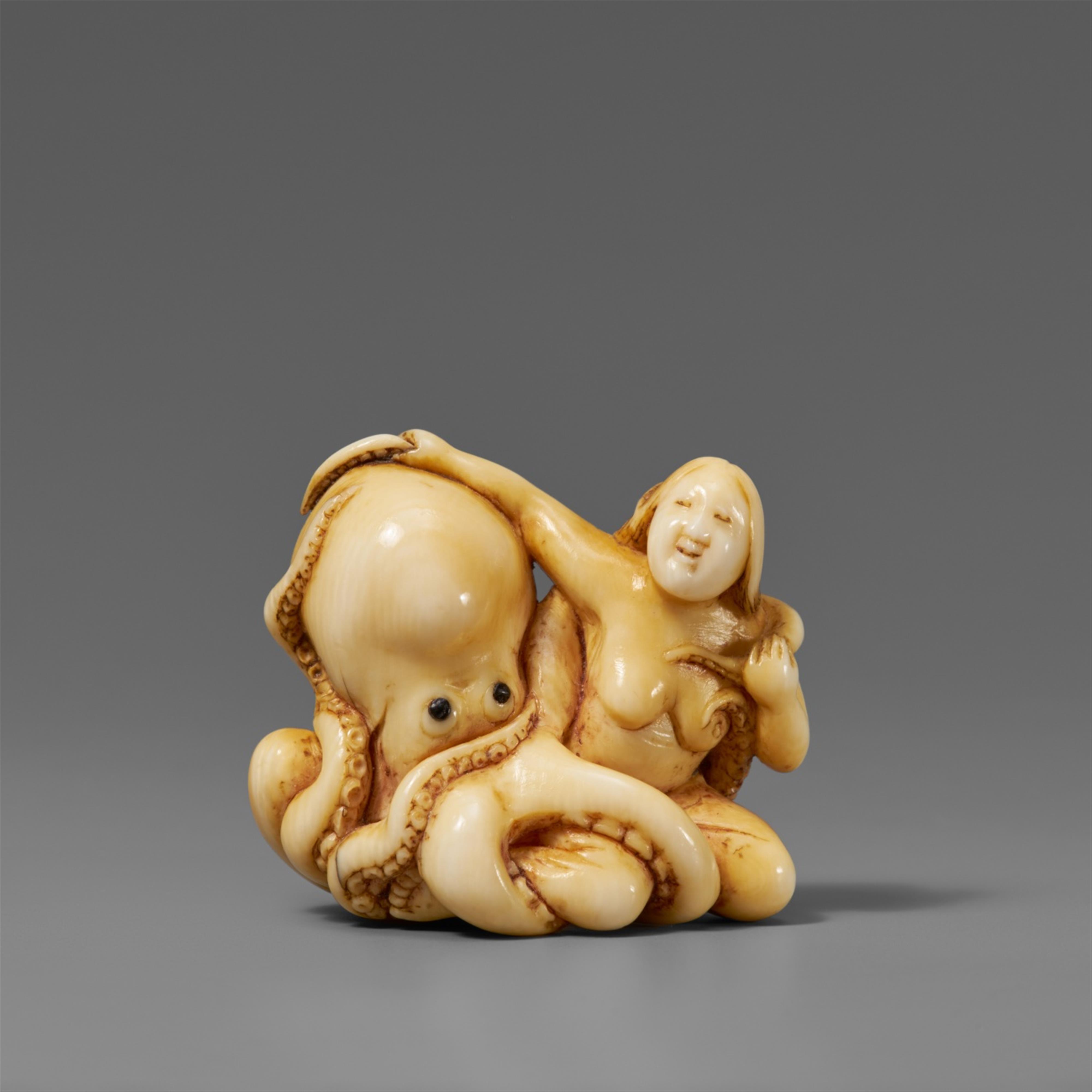 An ivory shunga netsuke of an awabi diver and octopus in amorous embrace. Early 19th century - image-1