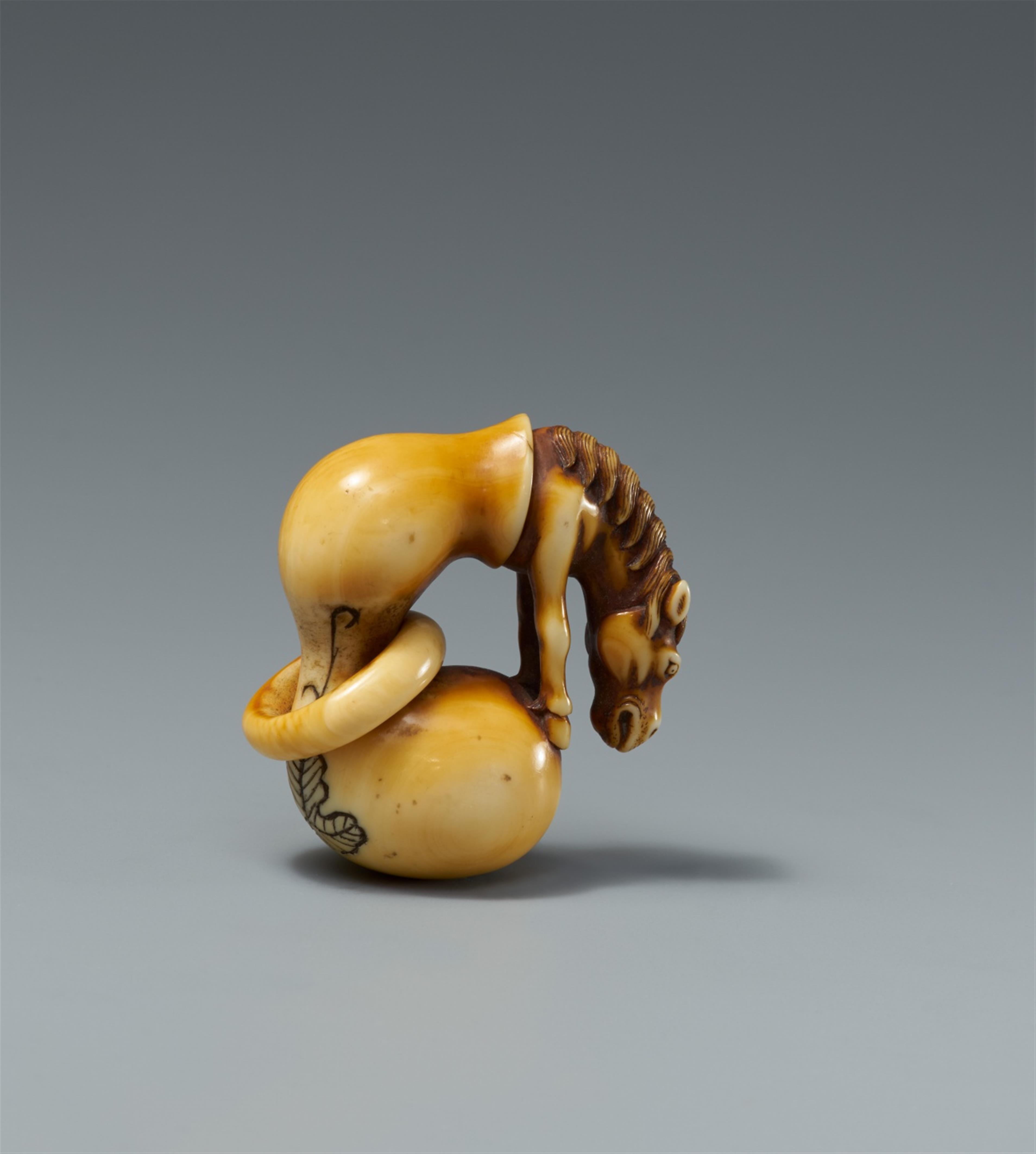 A partly stained ivory netsuke of Chokaro's horse. Late 18th century - image-2