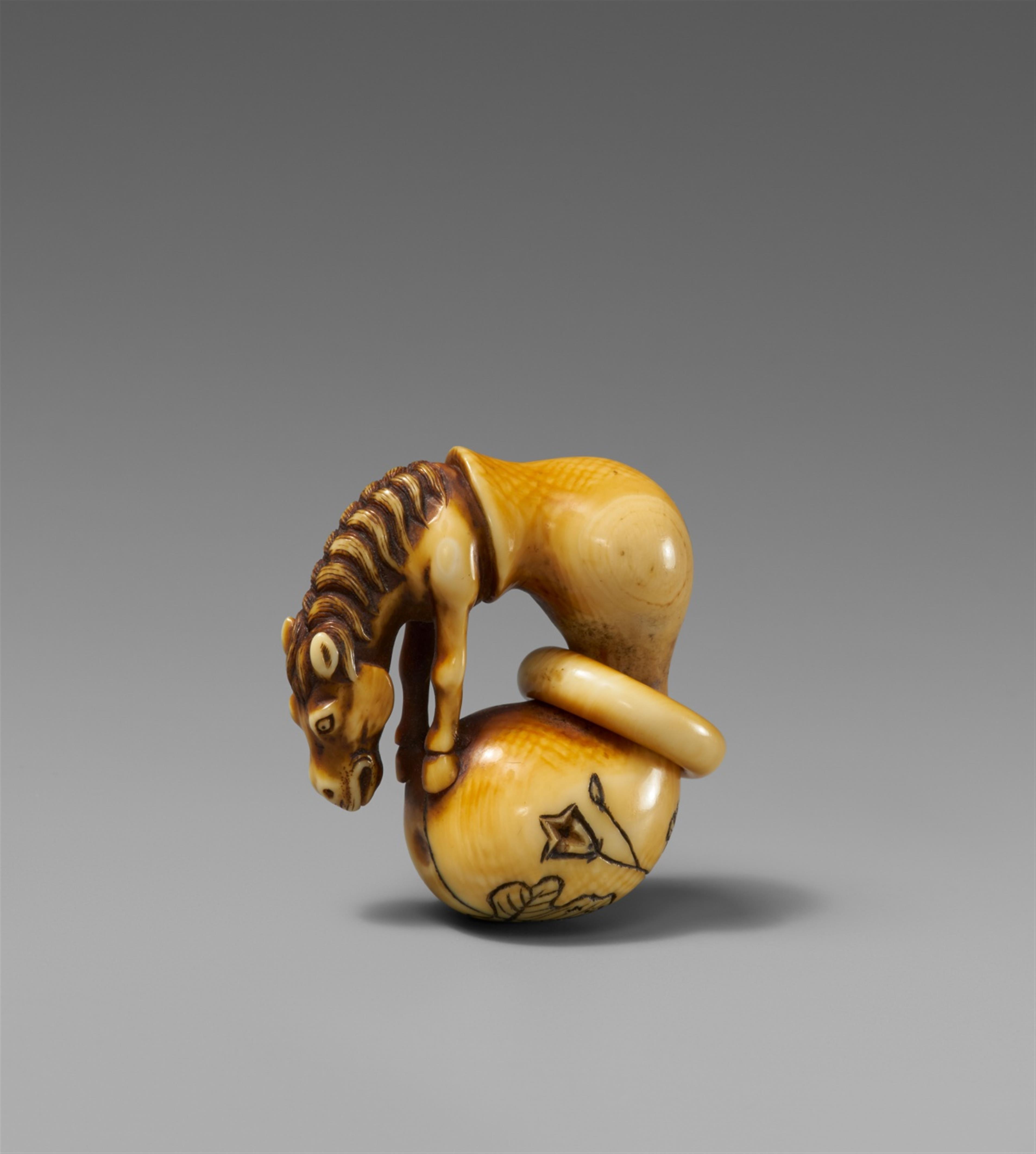 A partly stained ivory netsuke of Chokaro's horse. Late 18th century - image-1