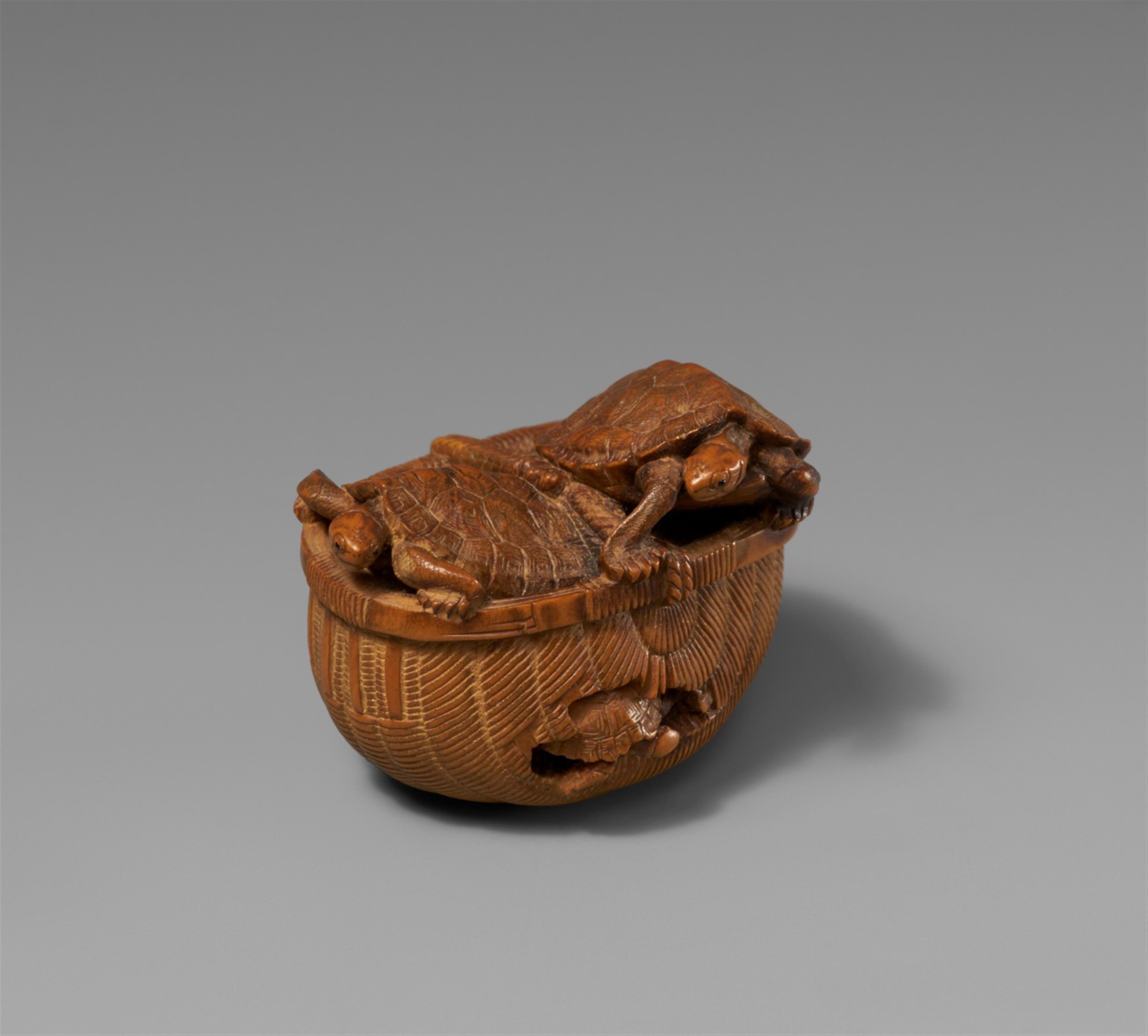 A light boxwood netsuke of tortoises in a basket. Late 19th century - image-1