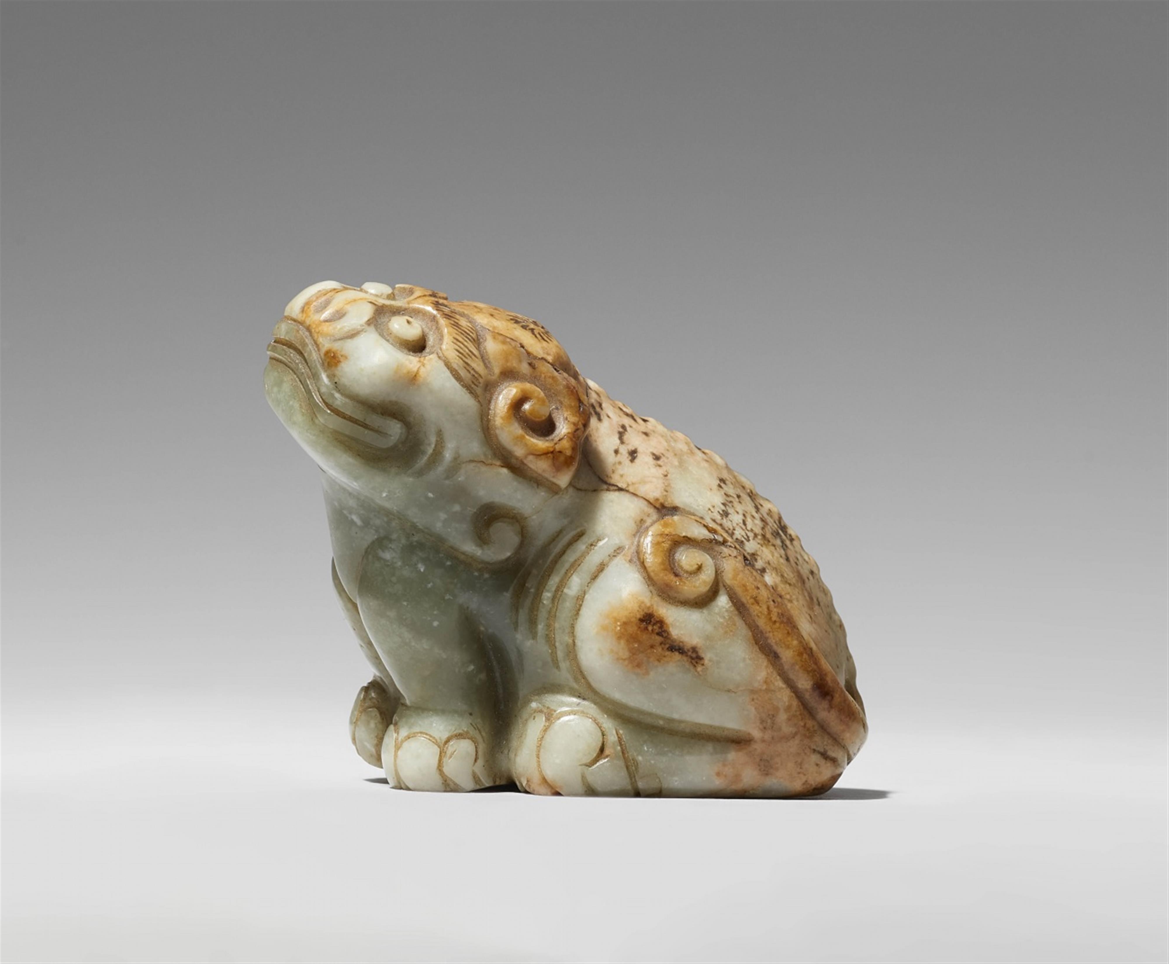 A celadon and russet jade carving of a mythical beast. 18th/19th century - image-1