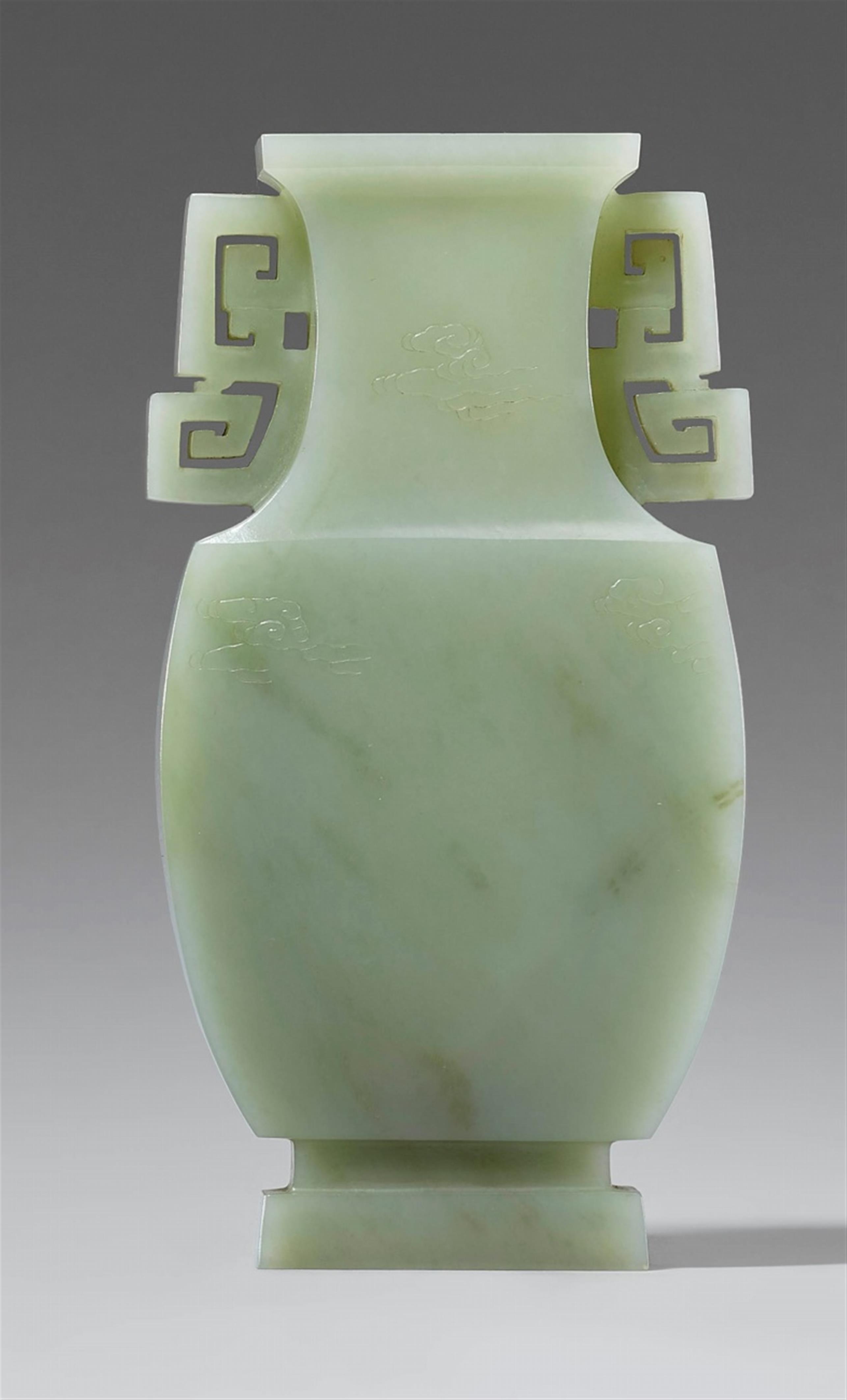 A pale celadon jade archaistic vase. Qing dynasty - image-1