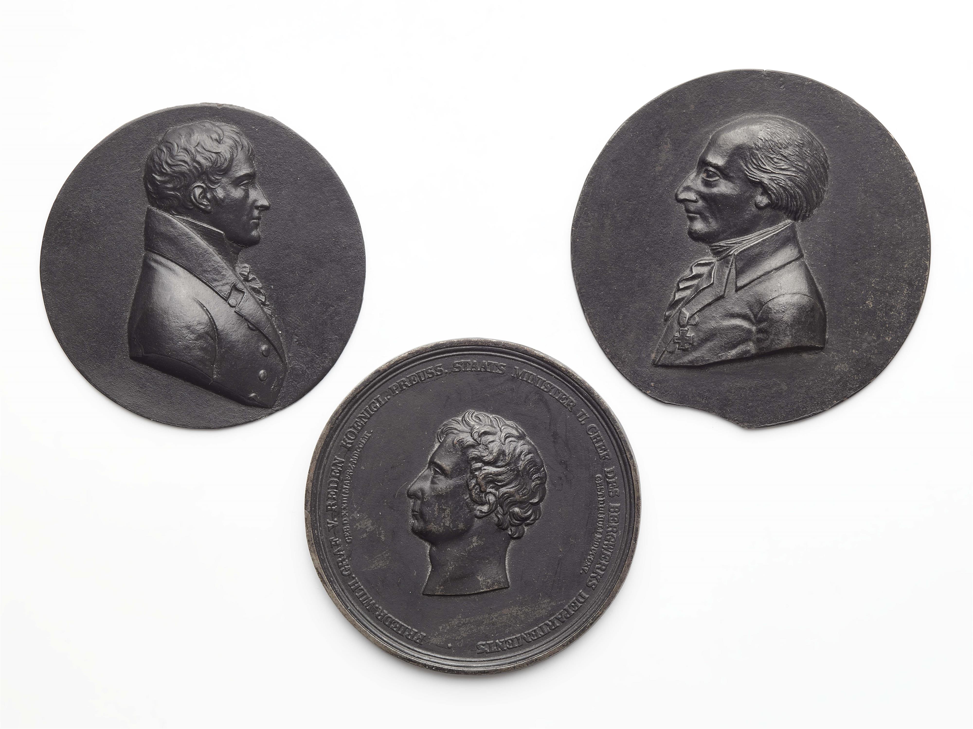 Two cast iron portrait plaques and a medallion - image-1