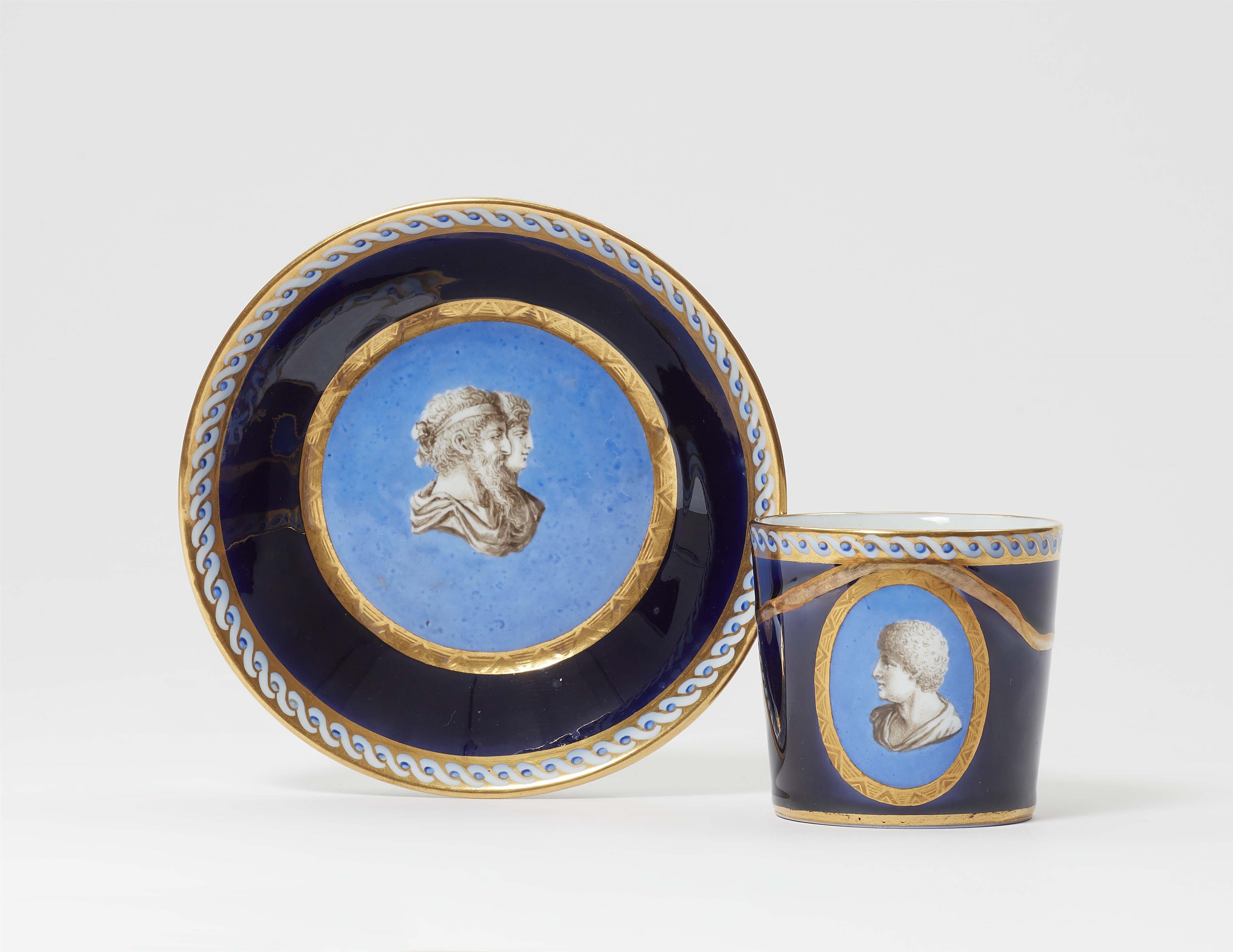 A porcelain cup and saucer with Neoclassical busts - image-1
