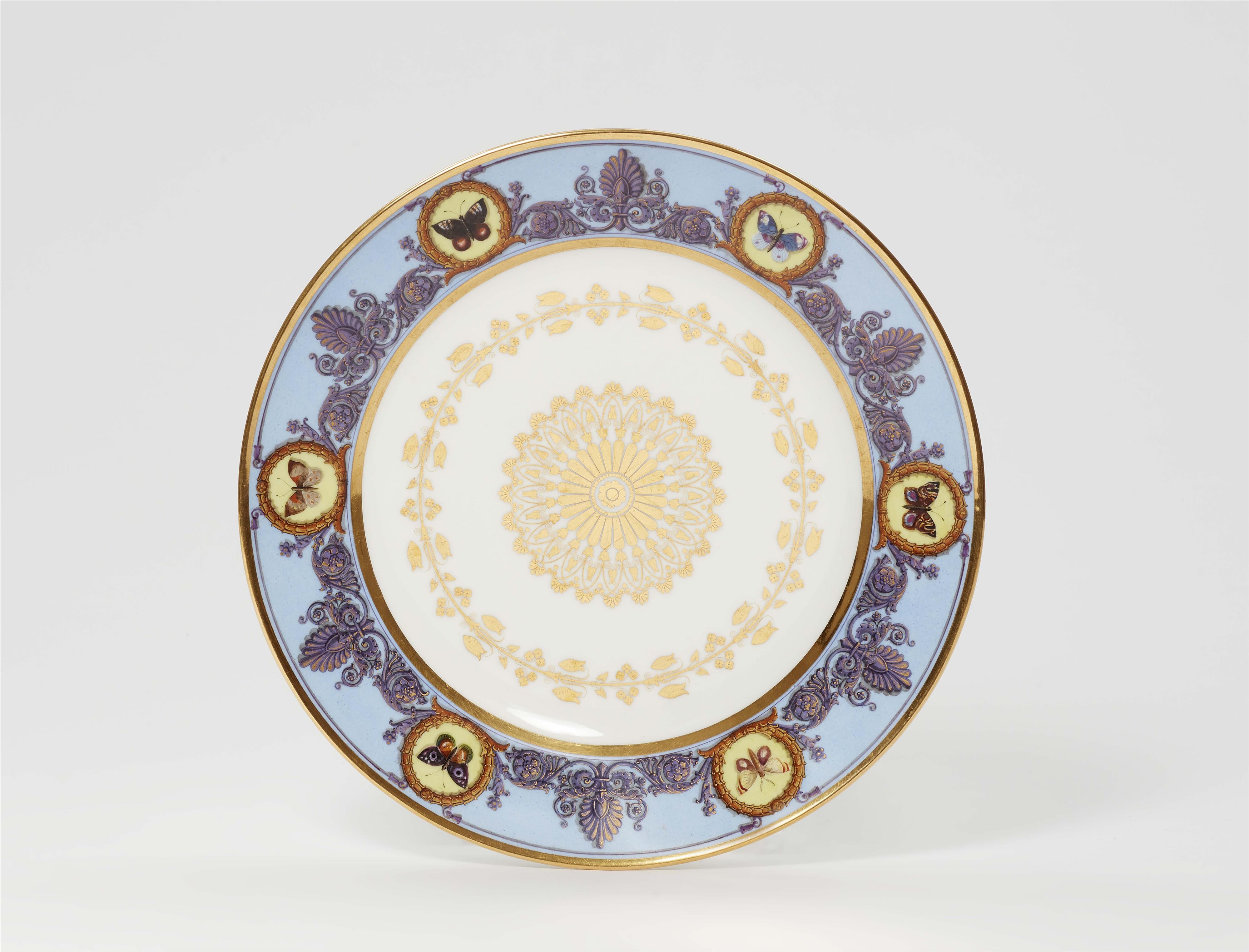 A rare Sèvres porcelain plate from a dinner service with palmettes and butterflies - image-1