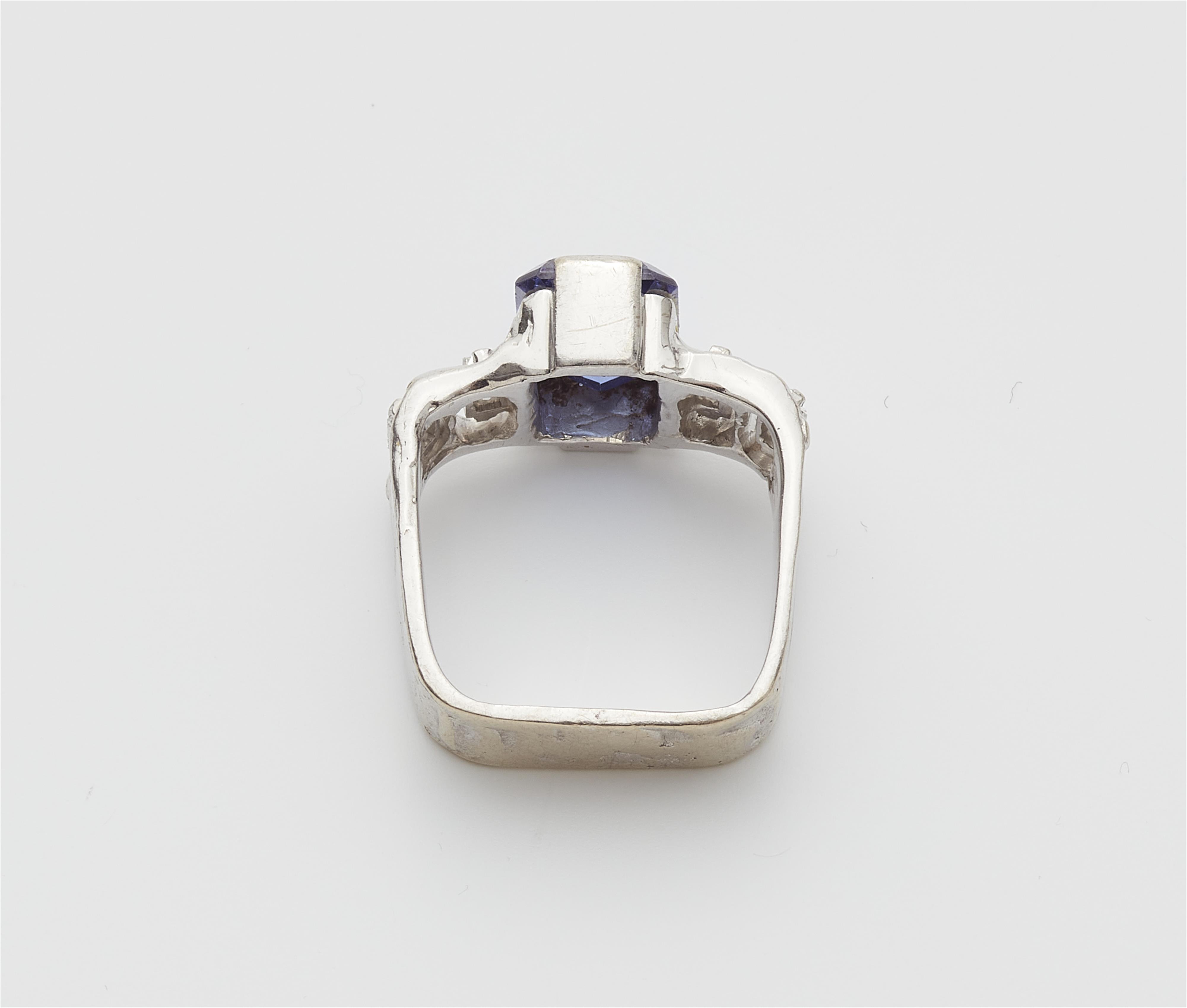 A German 14k gold diamond and tanzanite ring. - image-2