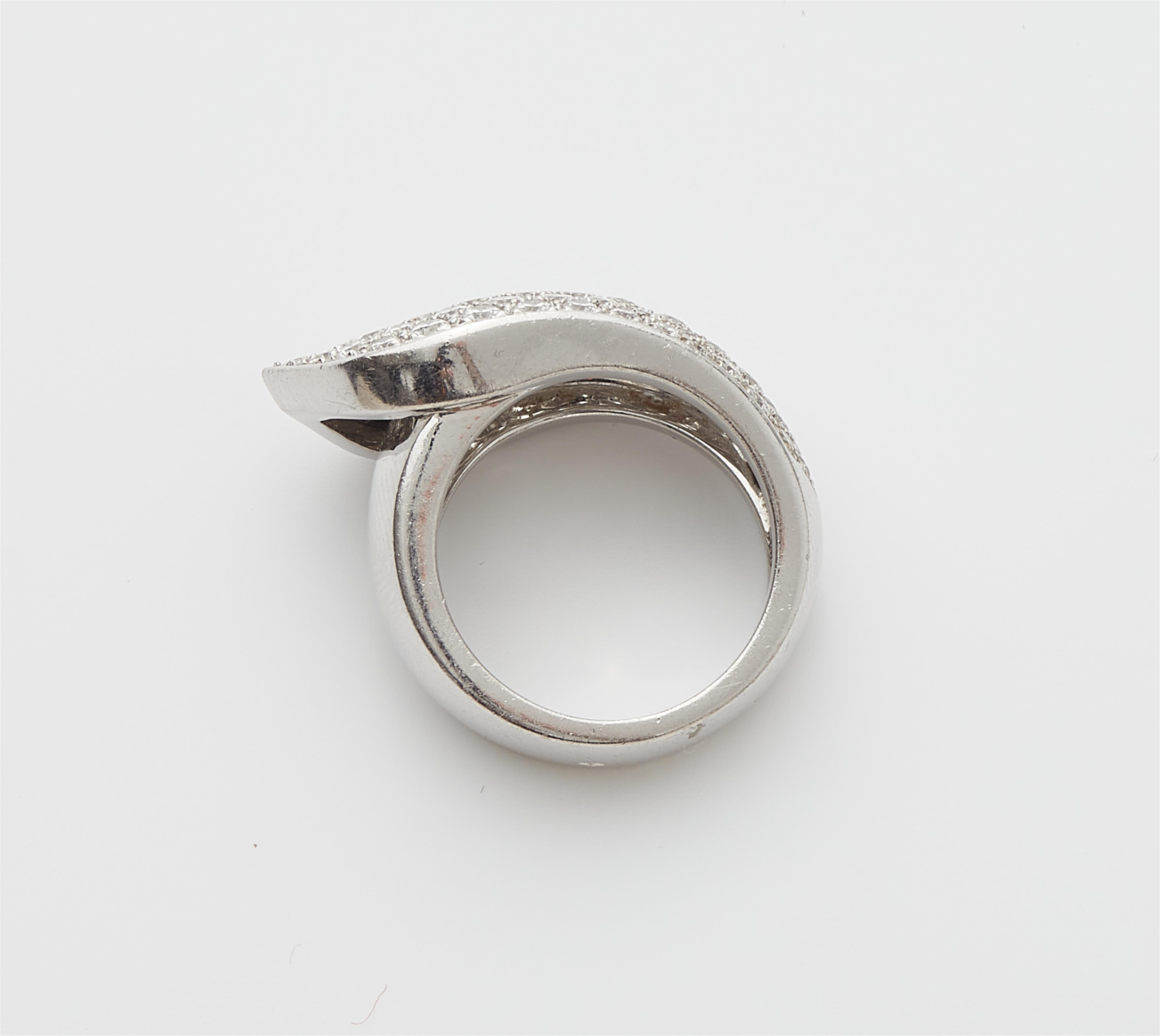 A French 18k white gold pavé diamond ring. - image-2