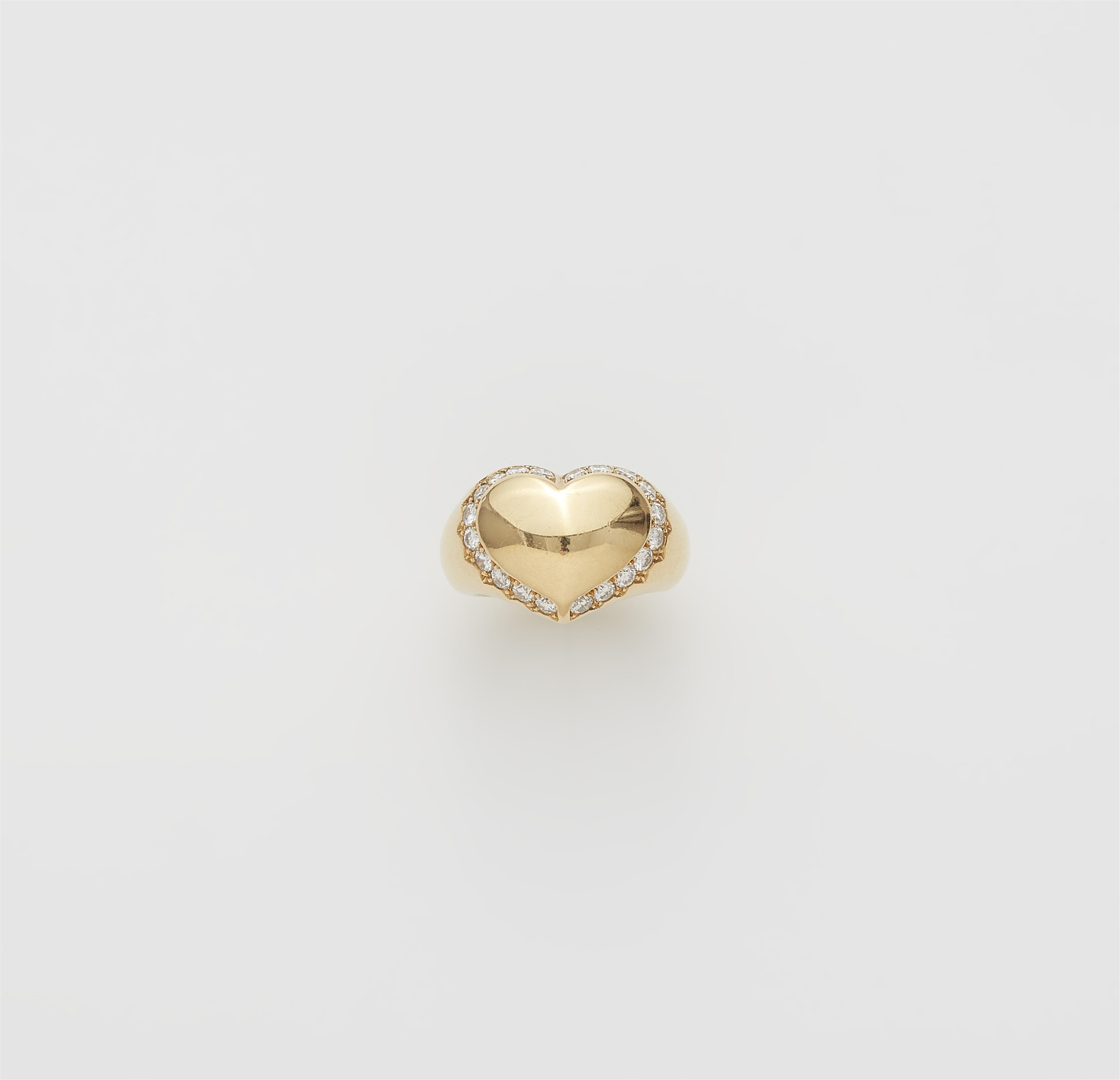 A French 18k gold and diamond heart ring. - image-1