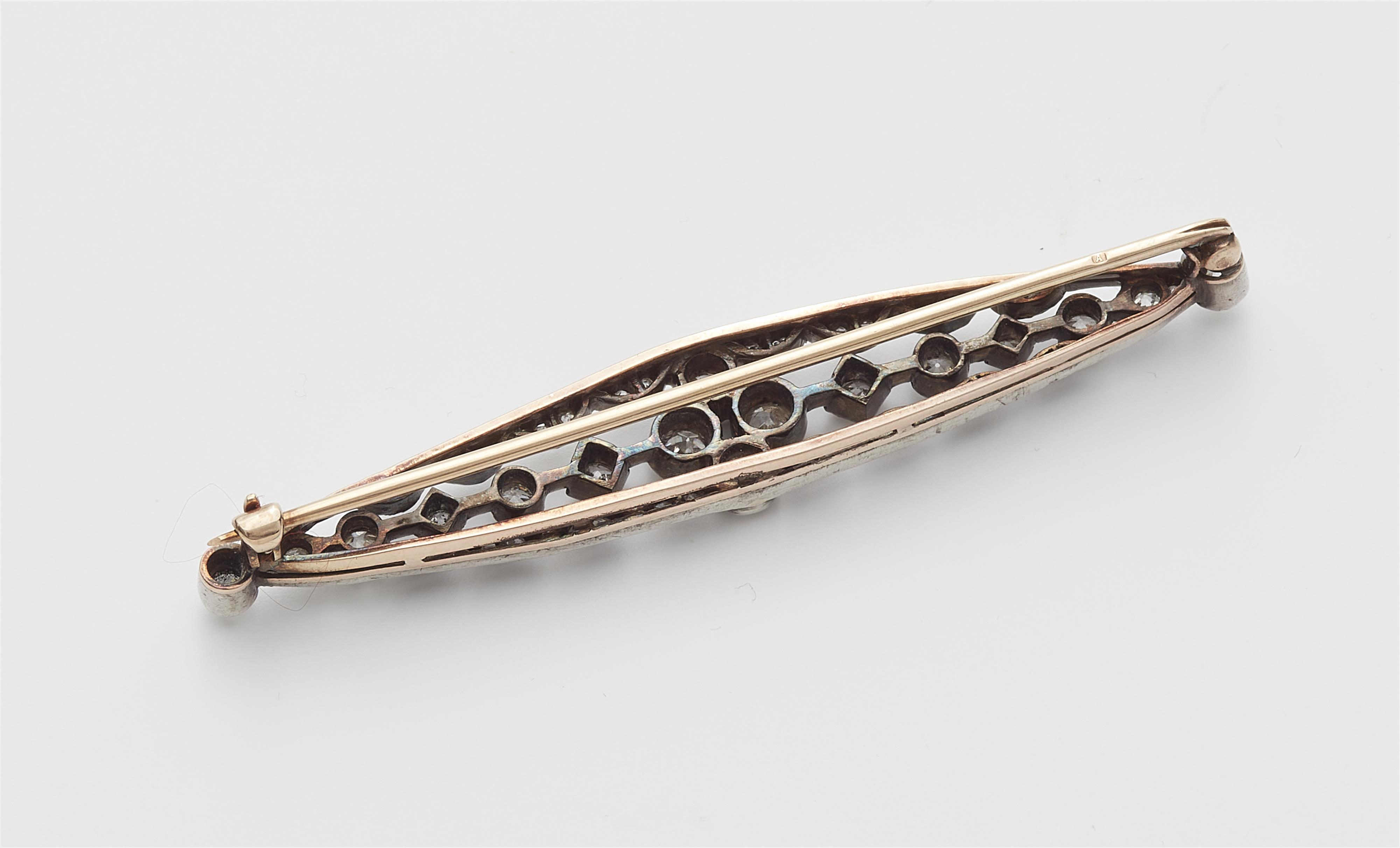 An Austrian late 19th century 14k red gold, silver and diamond bar brooch. - image-2