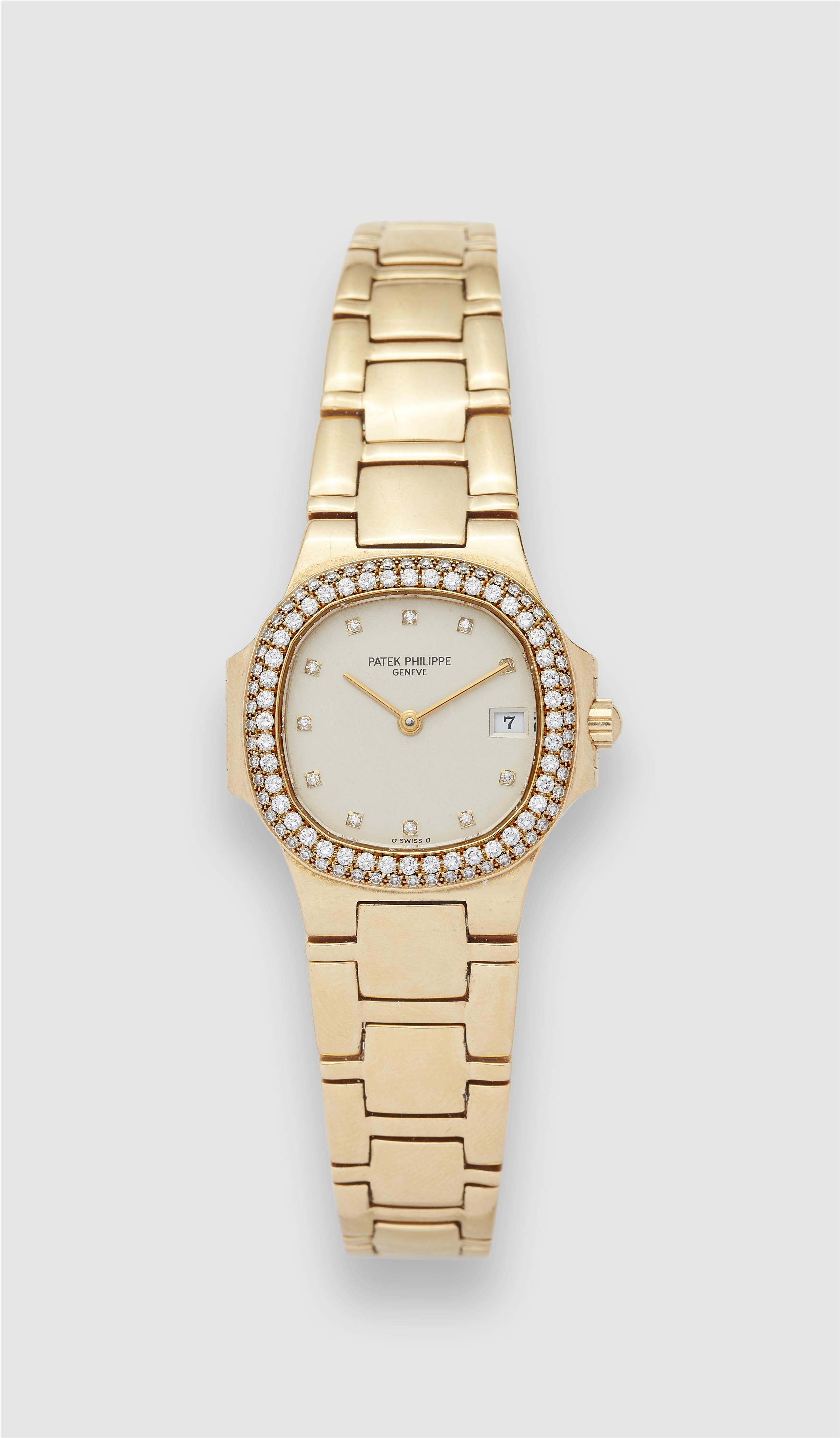 An 18k gold quartz Patek Philippe Nautilus Ref. 4700/54 ladies wristwatch. - image-1