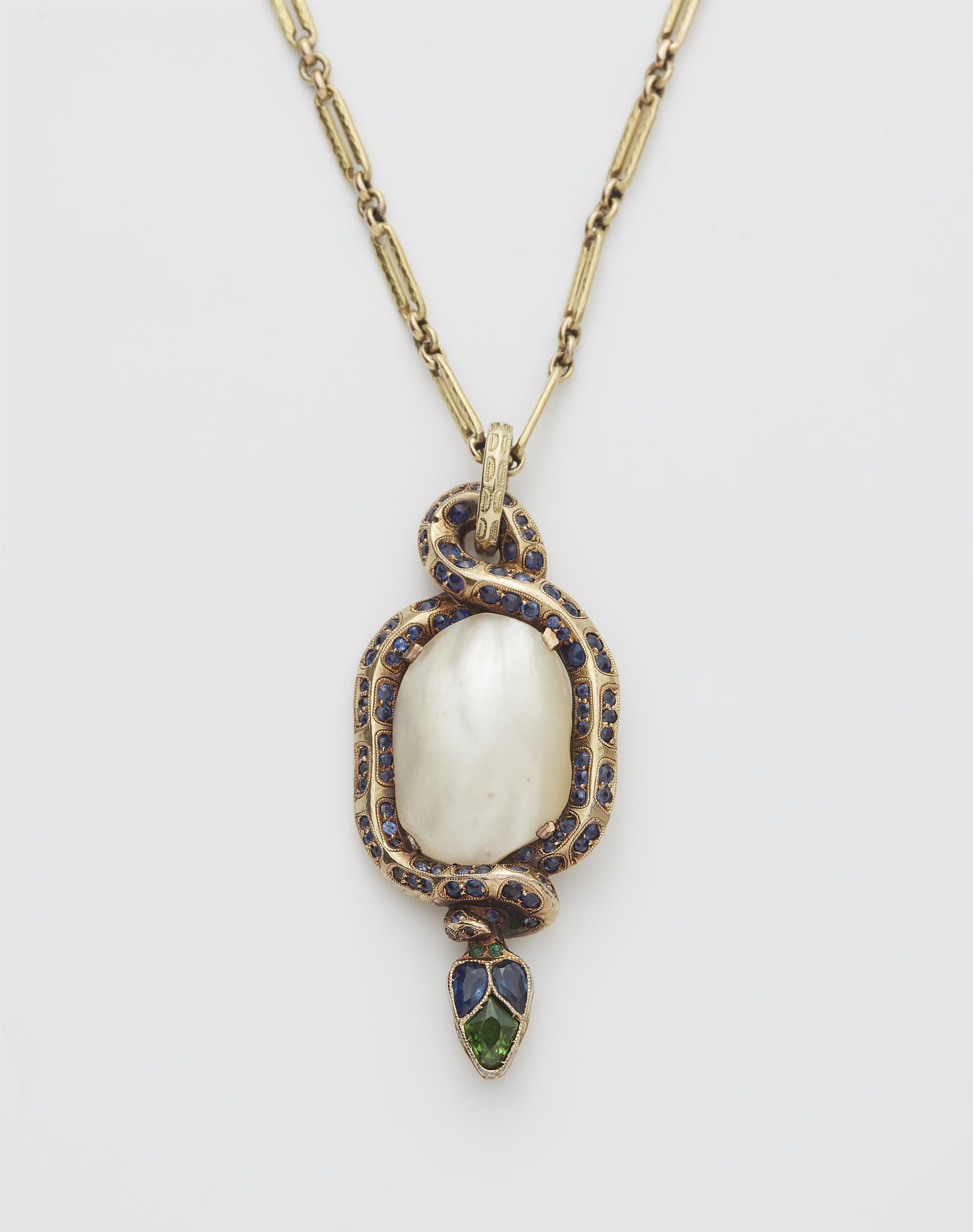 A German 18k gold sapphire, tsavorite and diamond Art Nouveau snake pendant with a large baroque Oriental pearl. - image-1