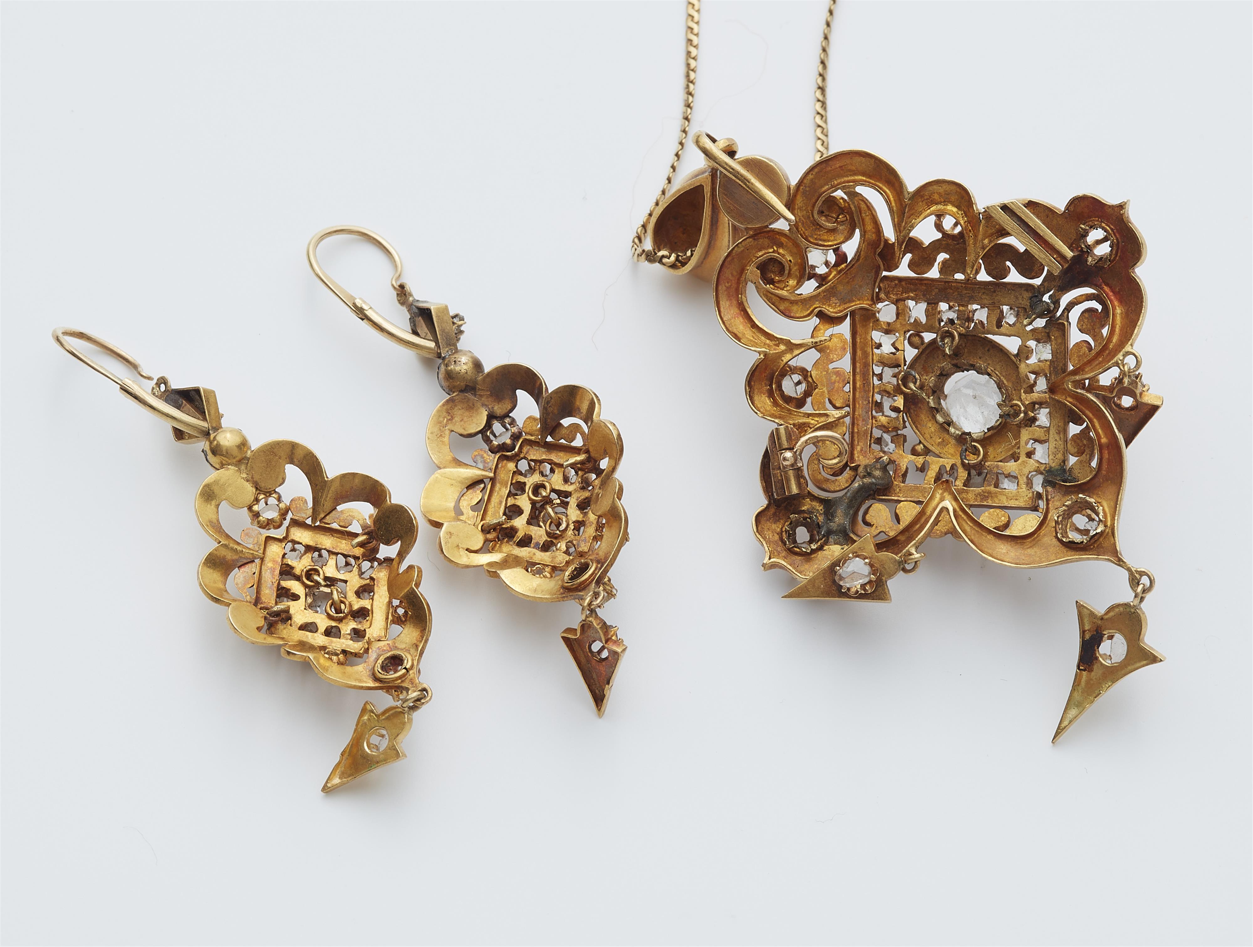 An Italian 18k gold black enamel and diamond historicist pendant brooch and pair of earrings. - image-2