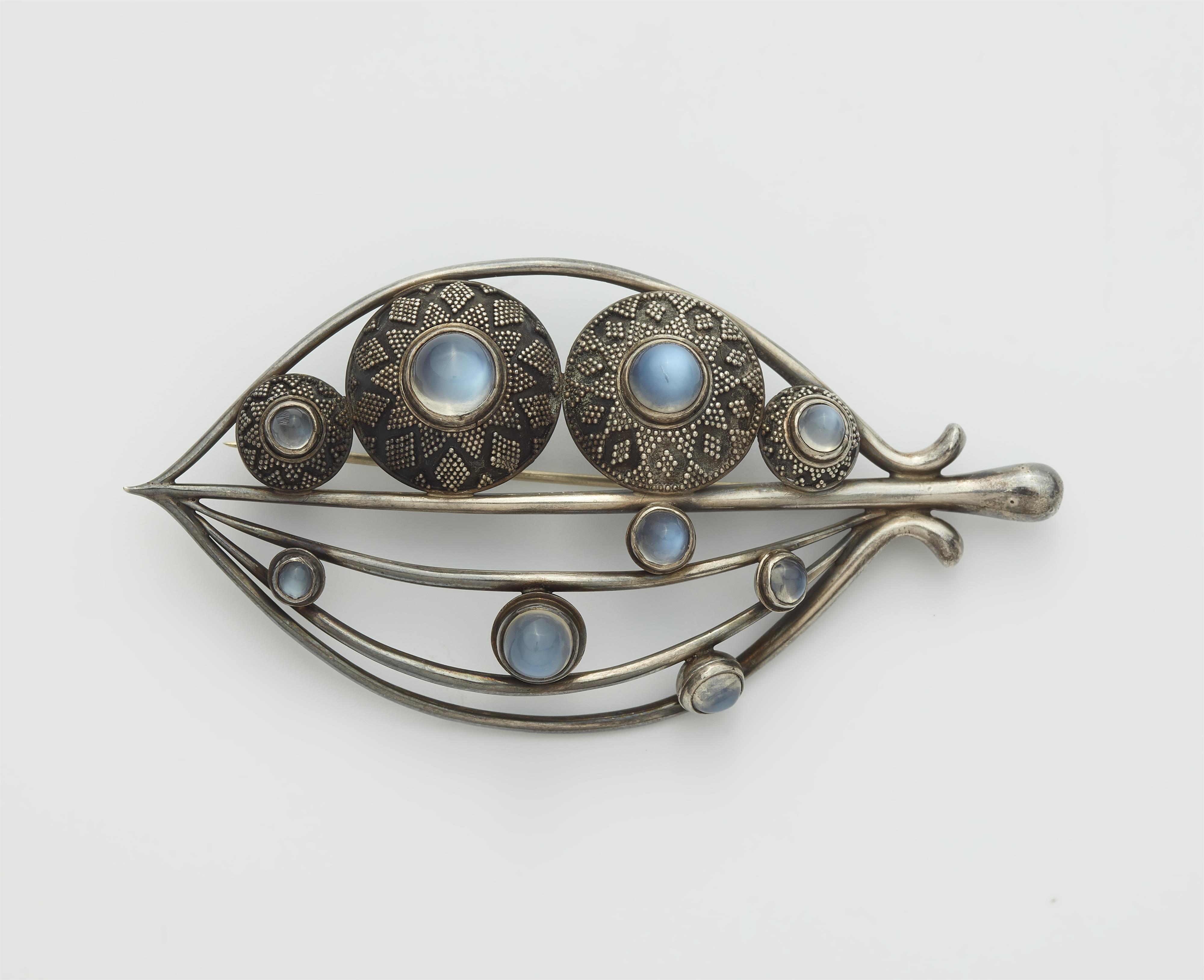 A silver granulation and moonstone brooch. - image-1