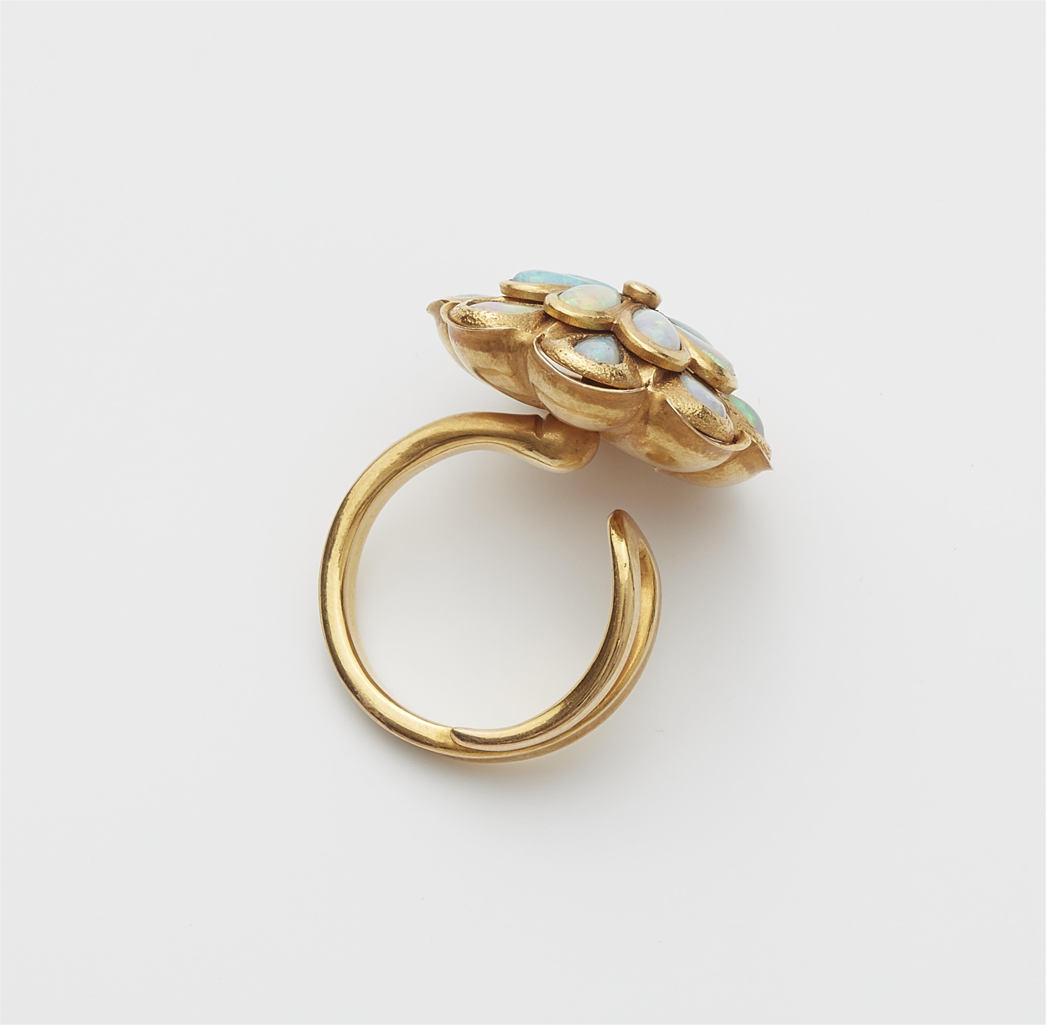 An 18k gold and Australian opal cluster ring - image-2