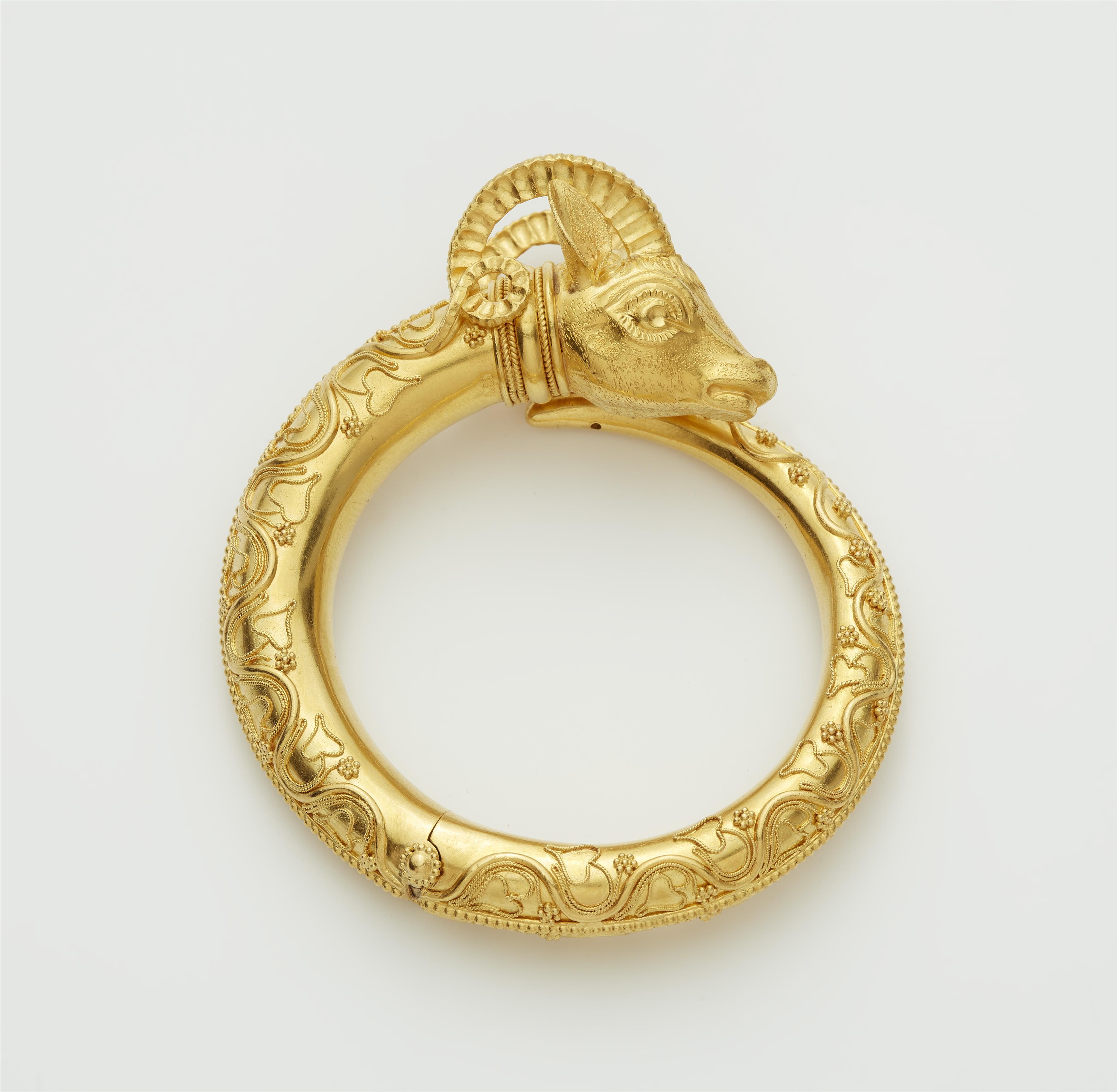 A Greek 18/21k gold rams head bangle. - image-1