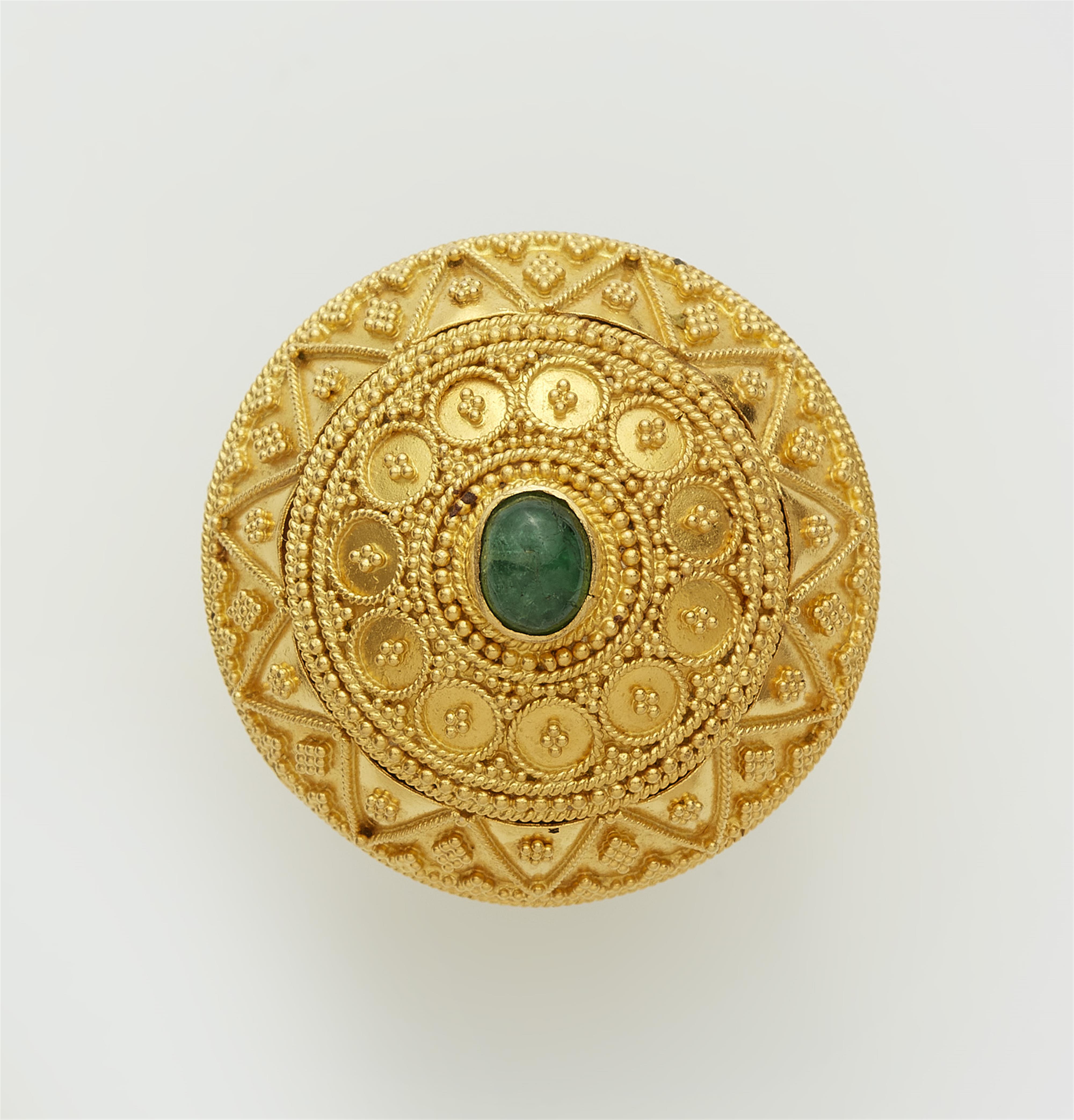 A Greek 18k gold and emerald Hellenistic style buckle ring. - image-1