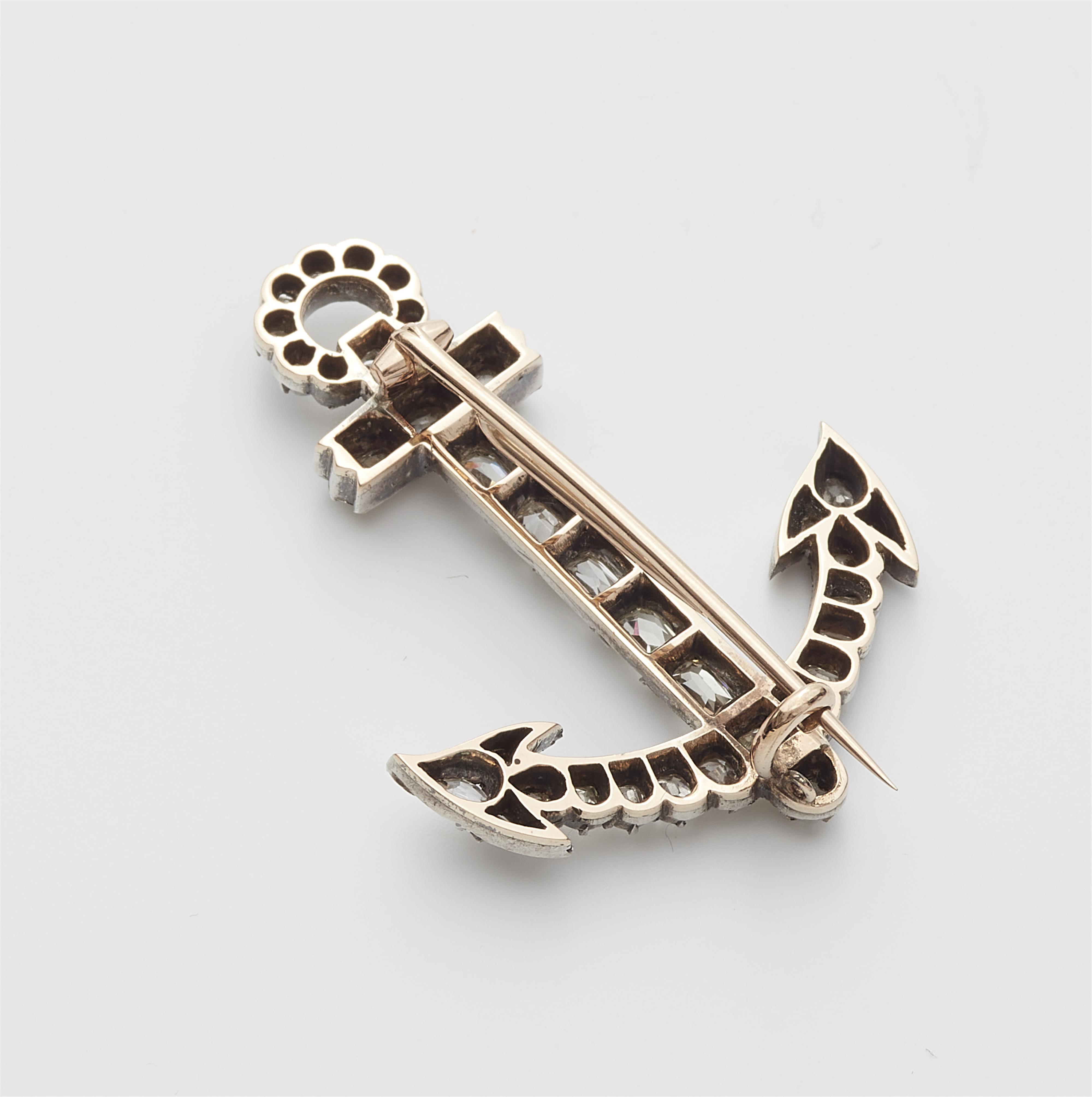 An early 19th century 14k gold, silver and diamond anchor brooch. - image-2