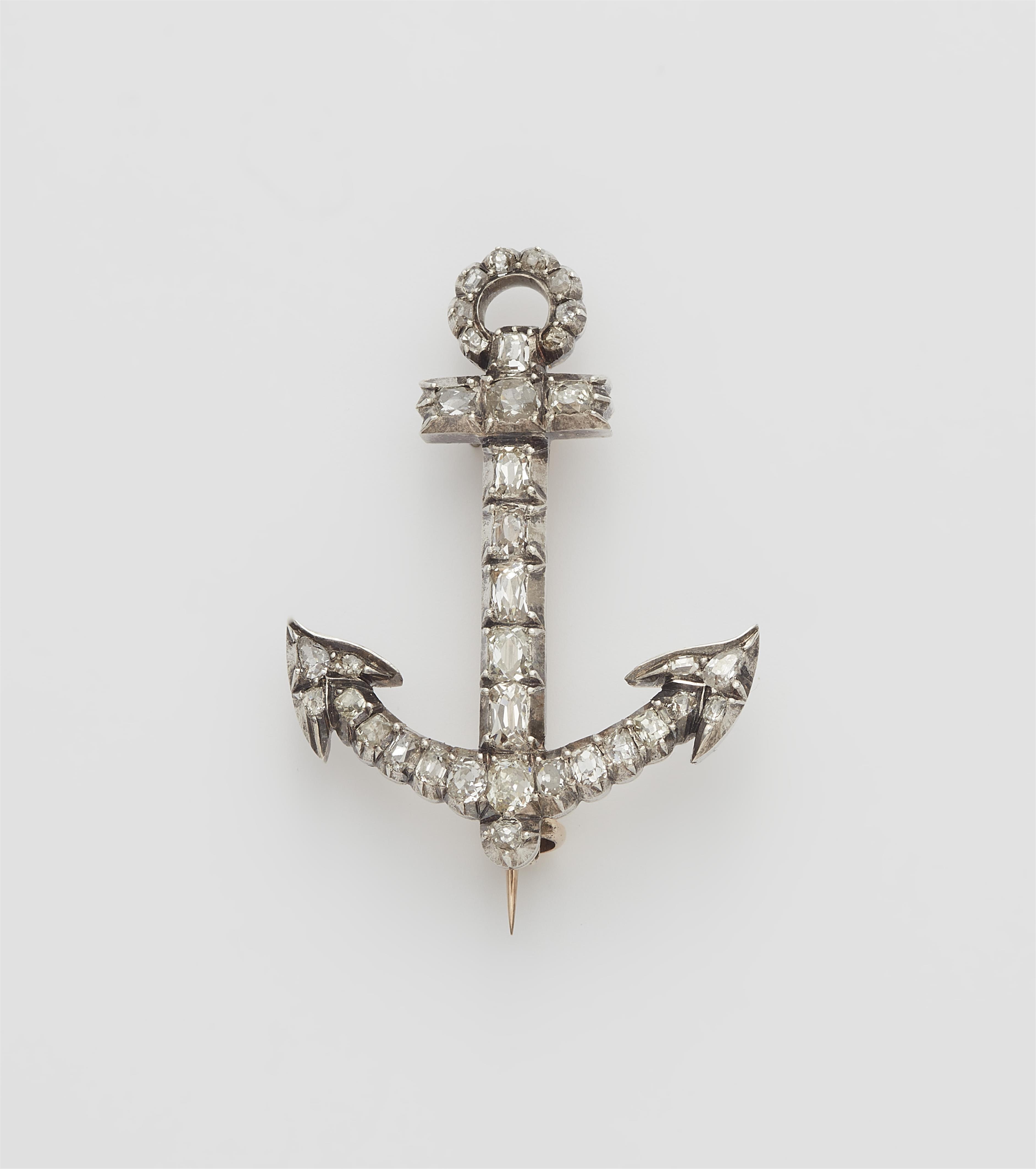 An early 19th century 14k gold, silver and diamond anchor brooch. - image-1
