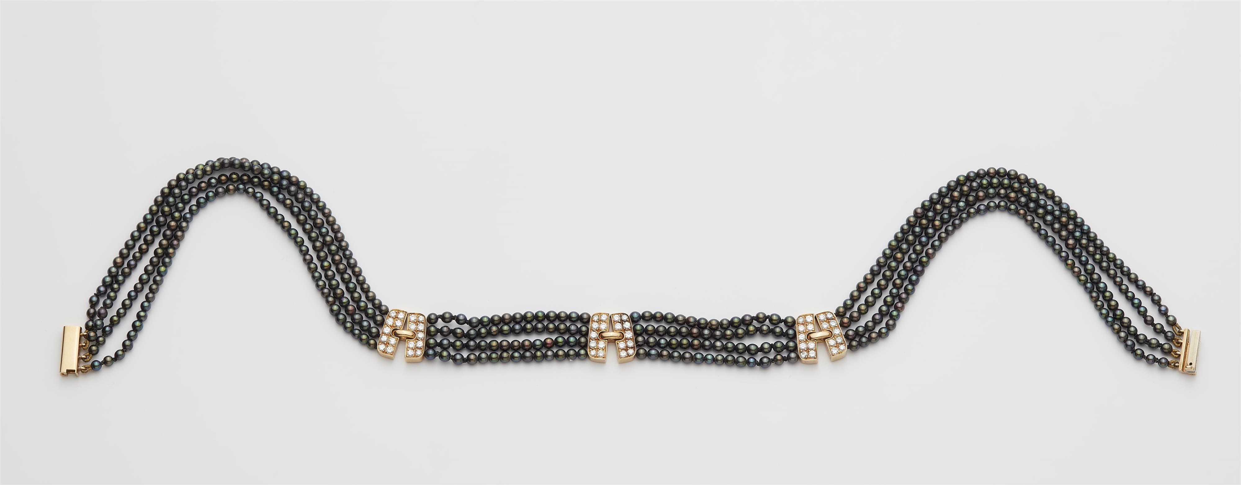 A German 18k gold anthracite cultured pearl and diamond choker. - image-1