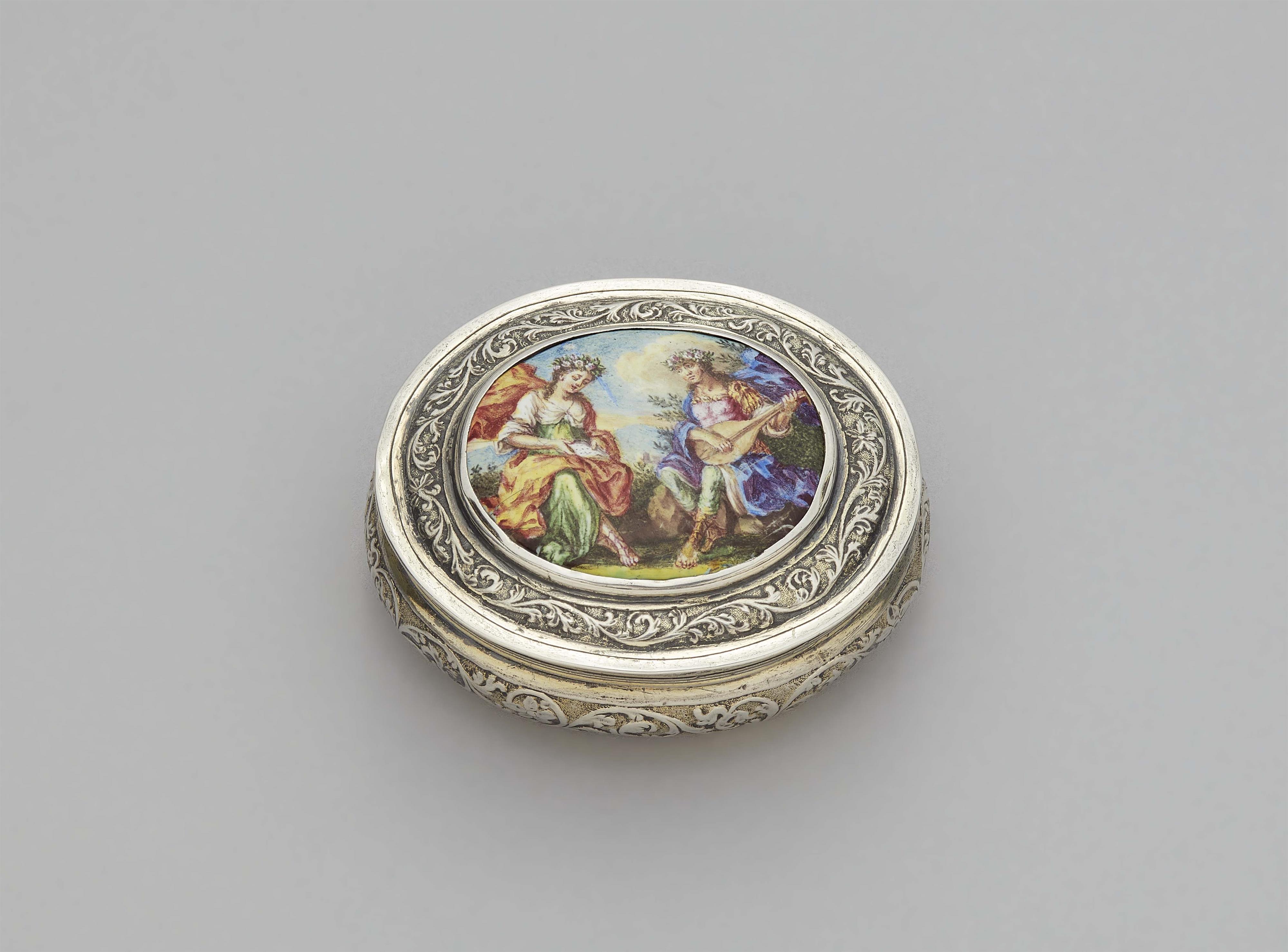 A silver box with an enamel plaque - image-1