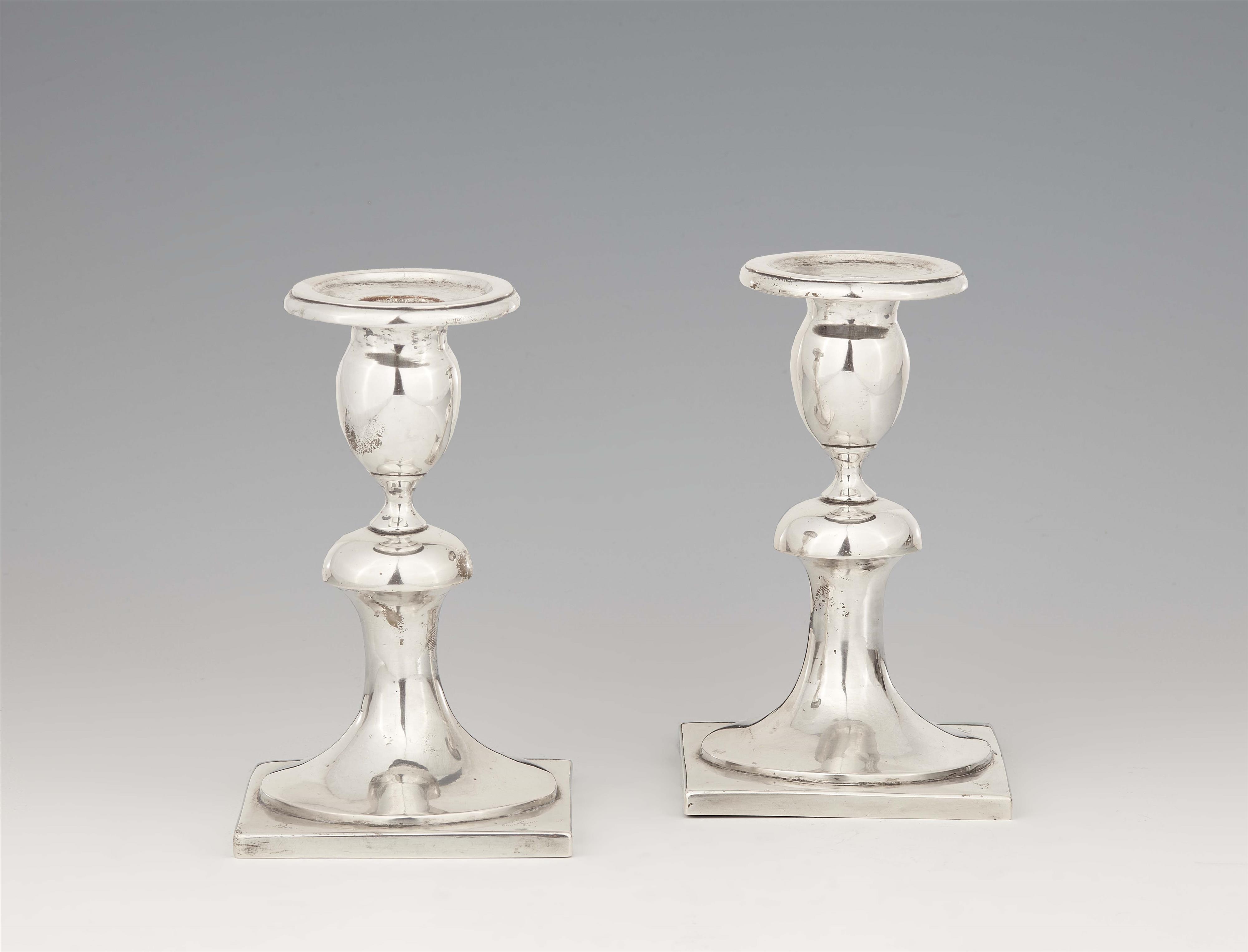 A pair of Krakau silver candlesticks - image-1