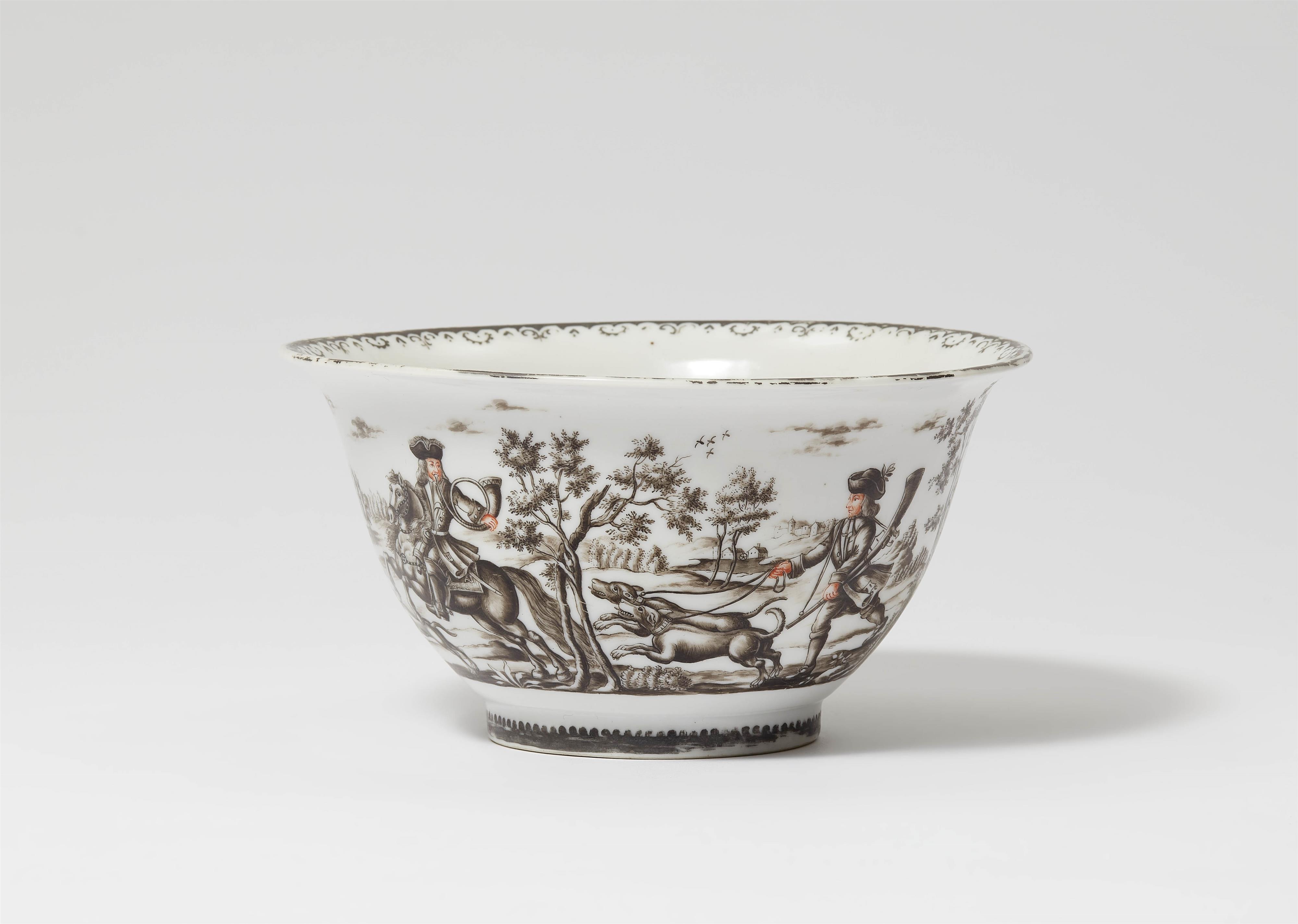 A porcelain bowl decorated with a stag hunt - image-1