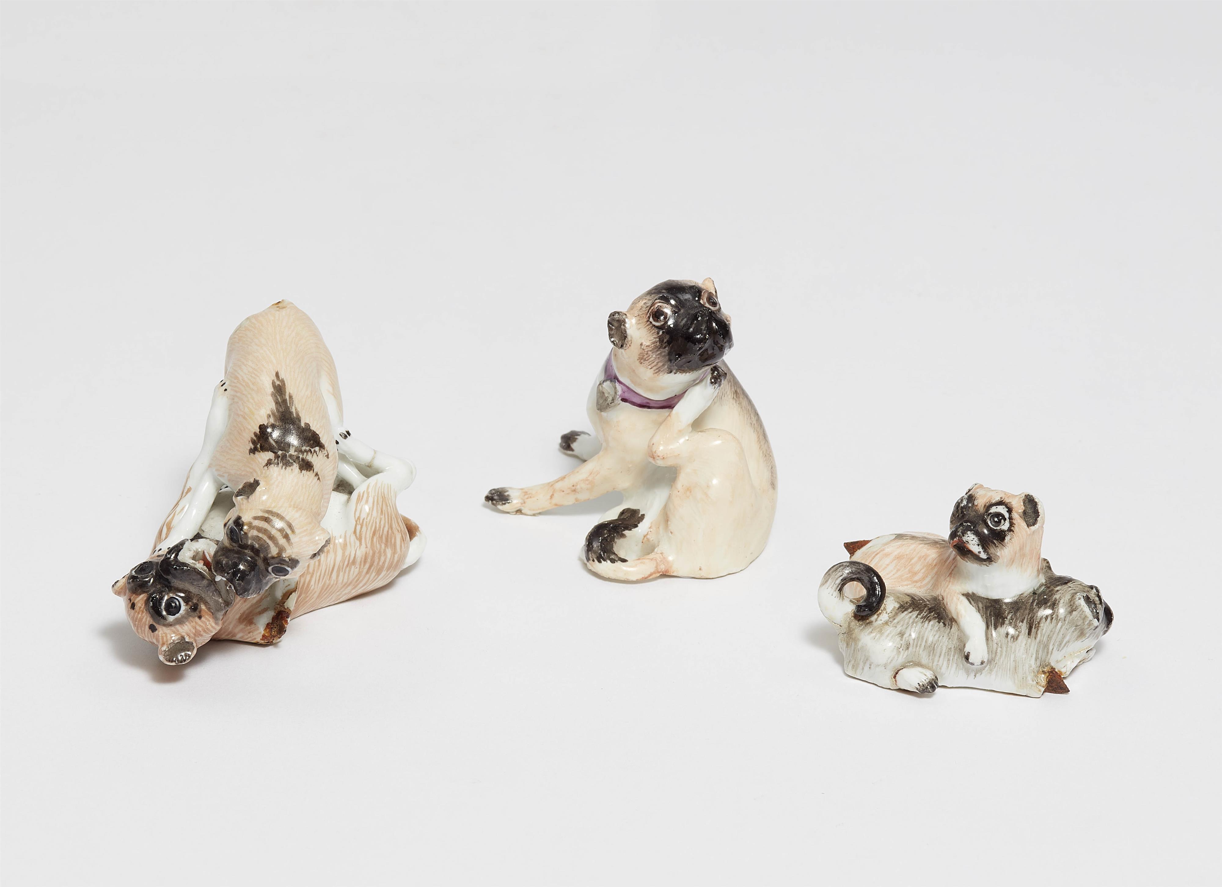 Five miniature Meissen porcelain pug dogs - image-1