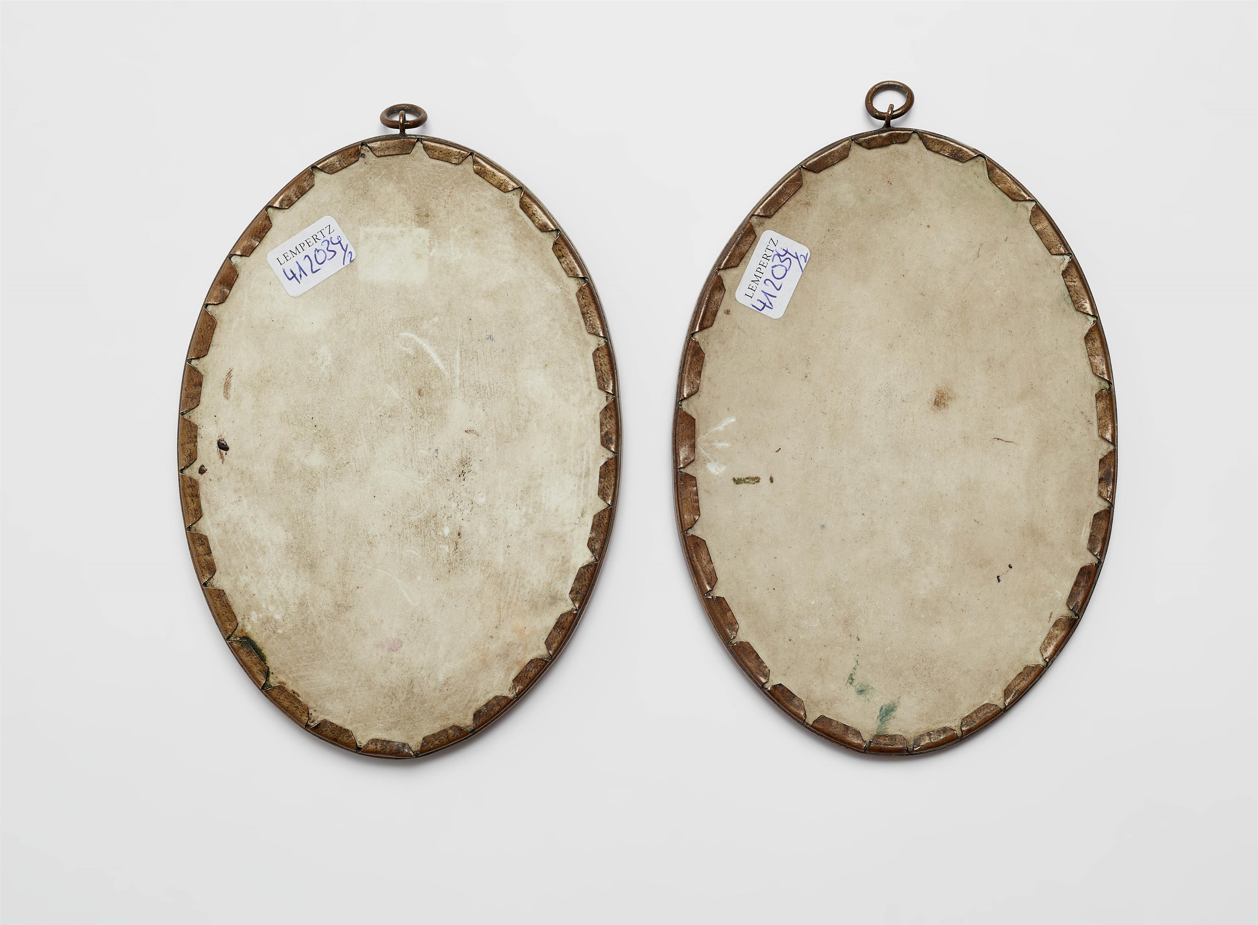 A pair of oval porcelain plaques with floral still lifes - image-2