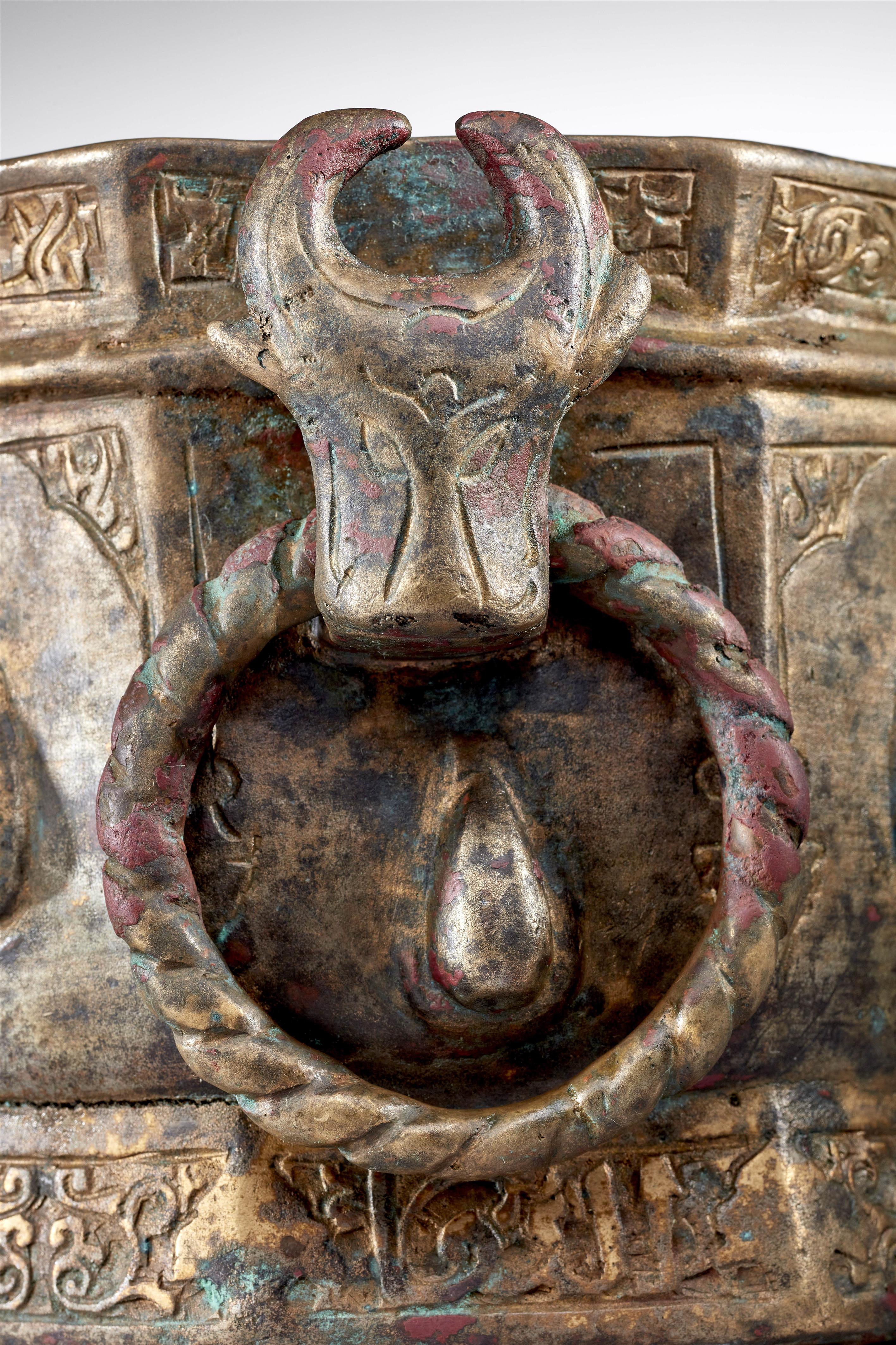 An Islamic mortar with a bull's head handle - image-7