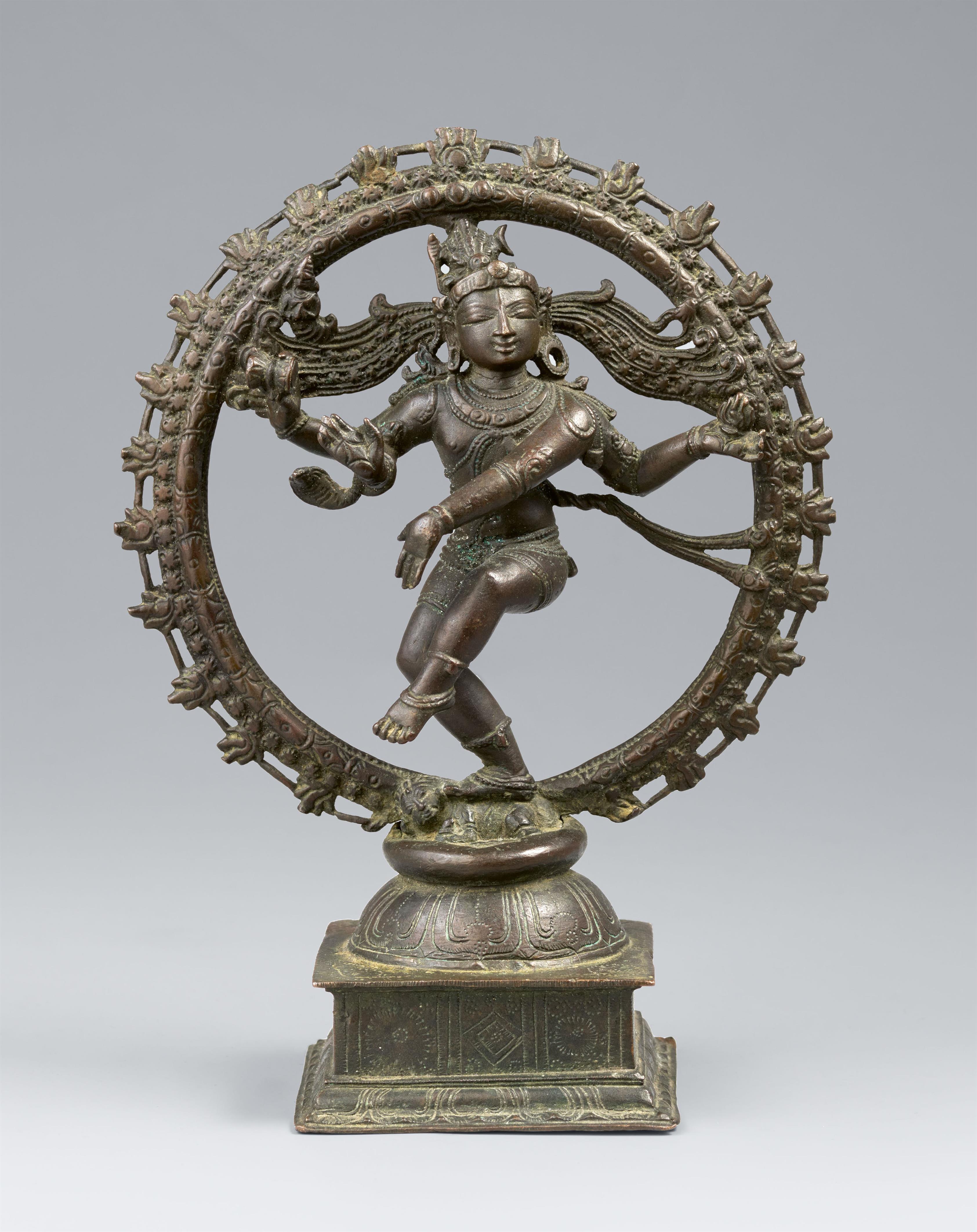 A Chola style copper alloy figure of Shiva Nataraja within a flaming aureole. Southern India. 19th century - image-1