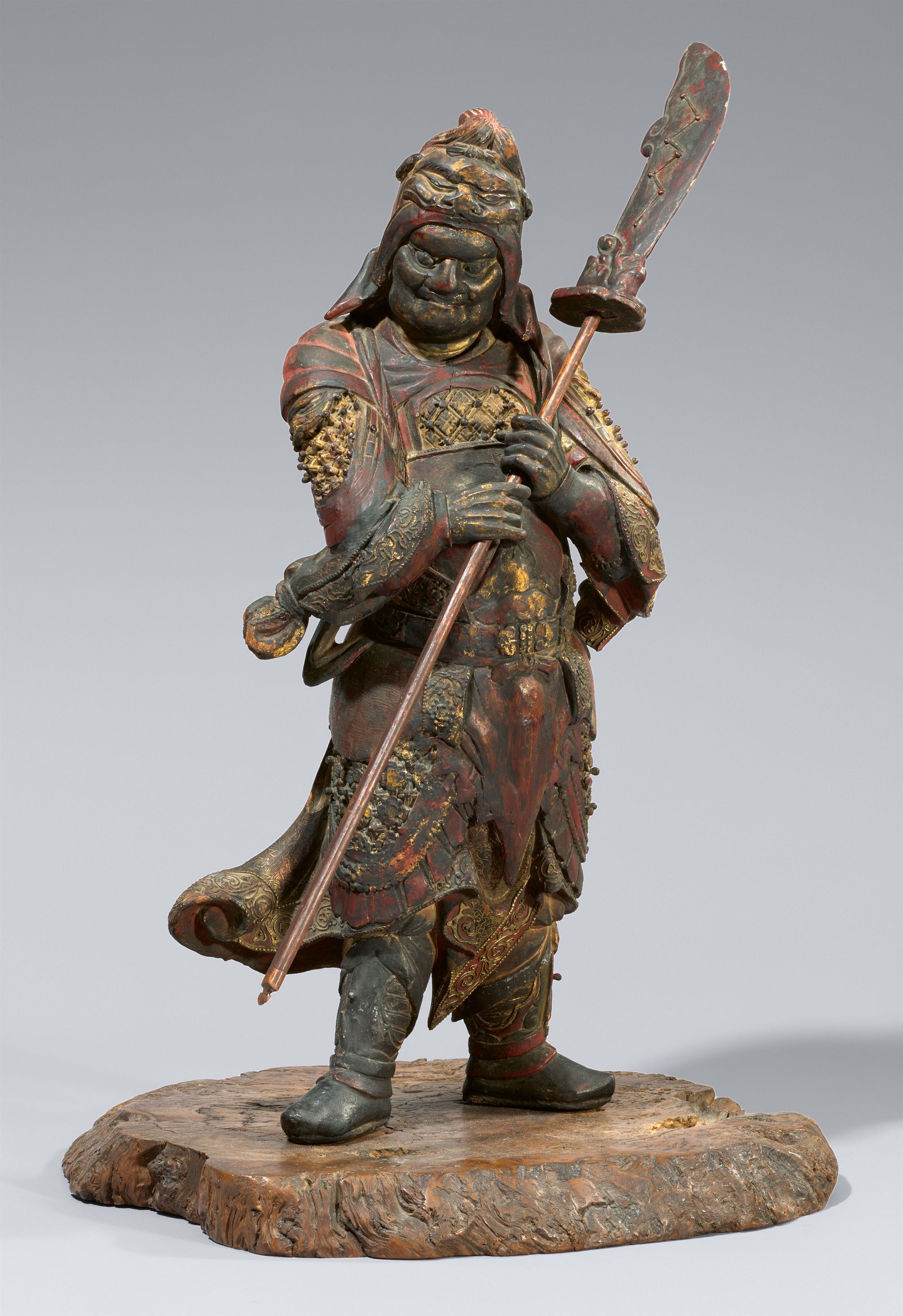 A polychrome and carved wood figure of a guardian. Edo period(?) - image-1