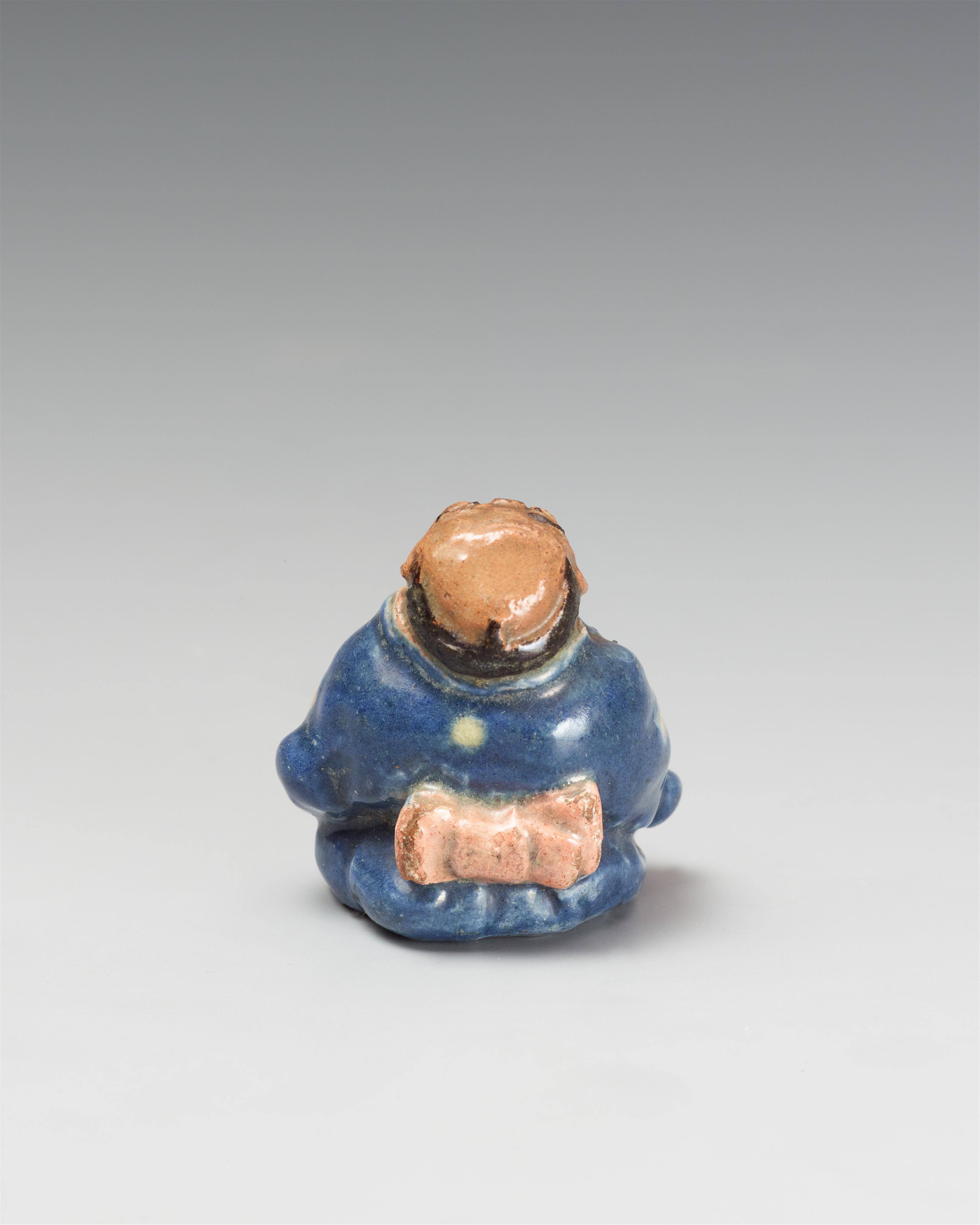 A glazed pottery netsuke of a professional sneezer. 19th century - image-2
