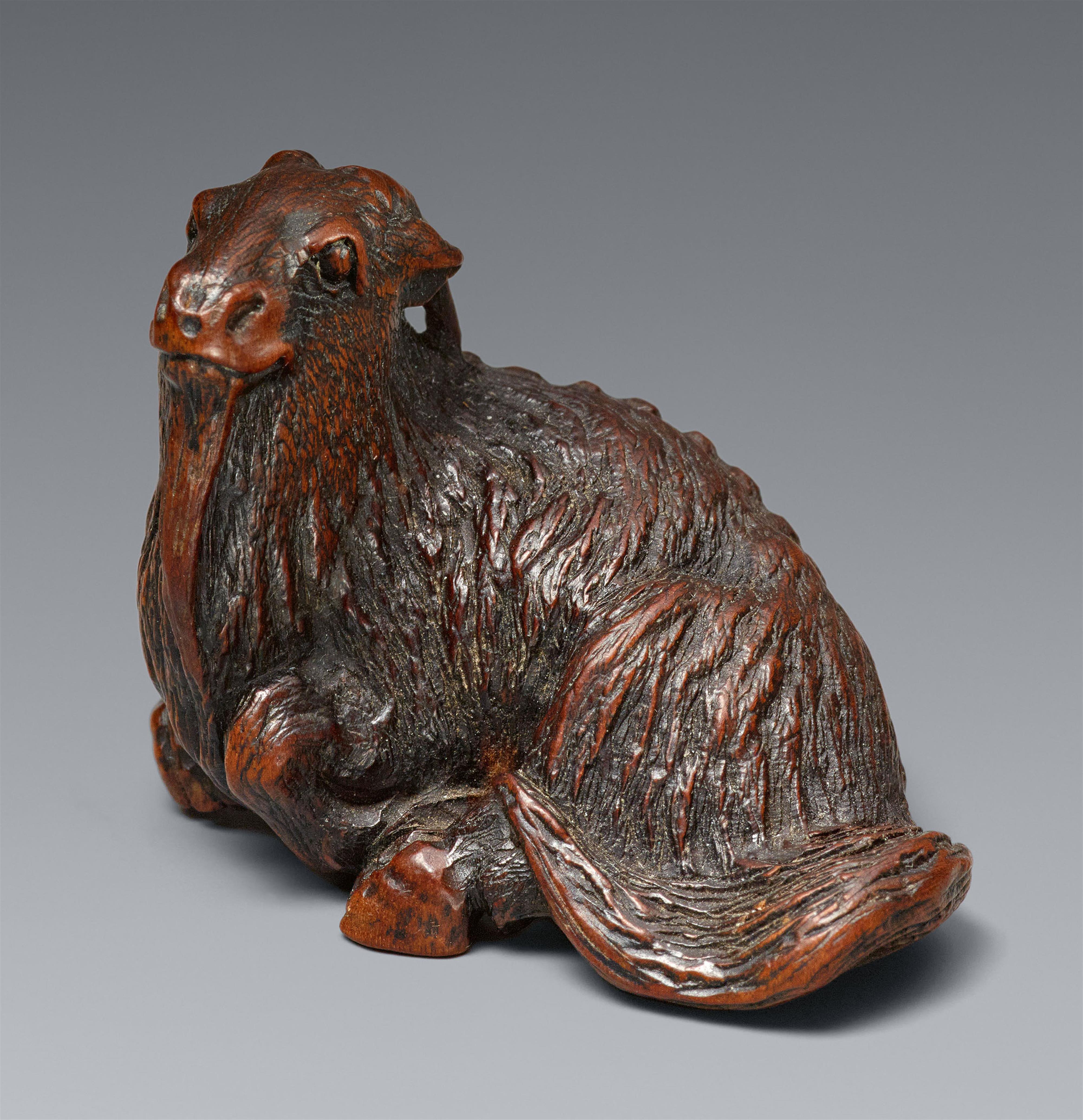 A Nagoya wood netsuke of a long-haired goat. Mid-19th century - image-1