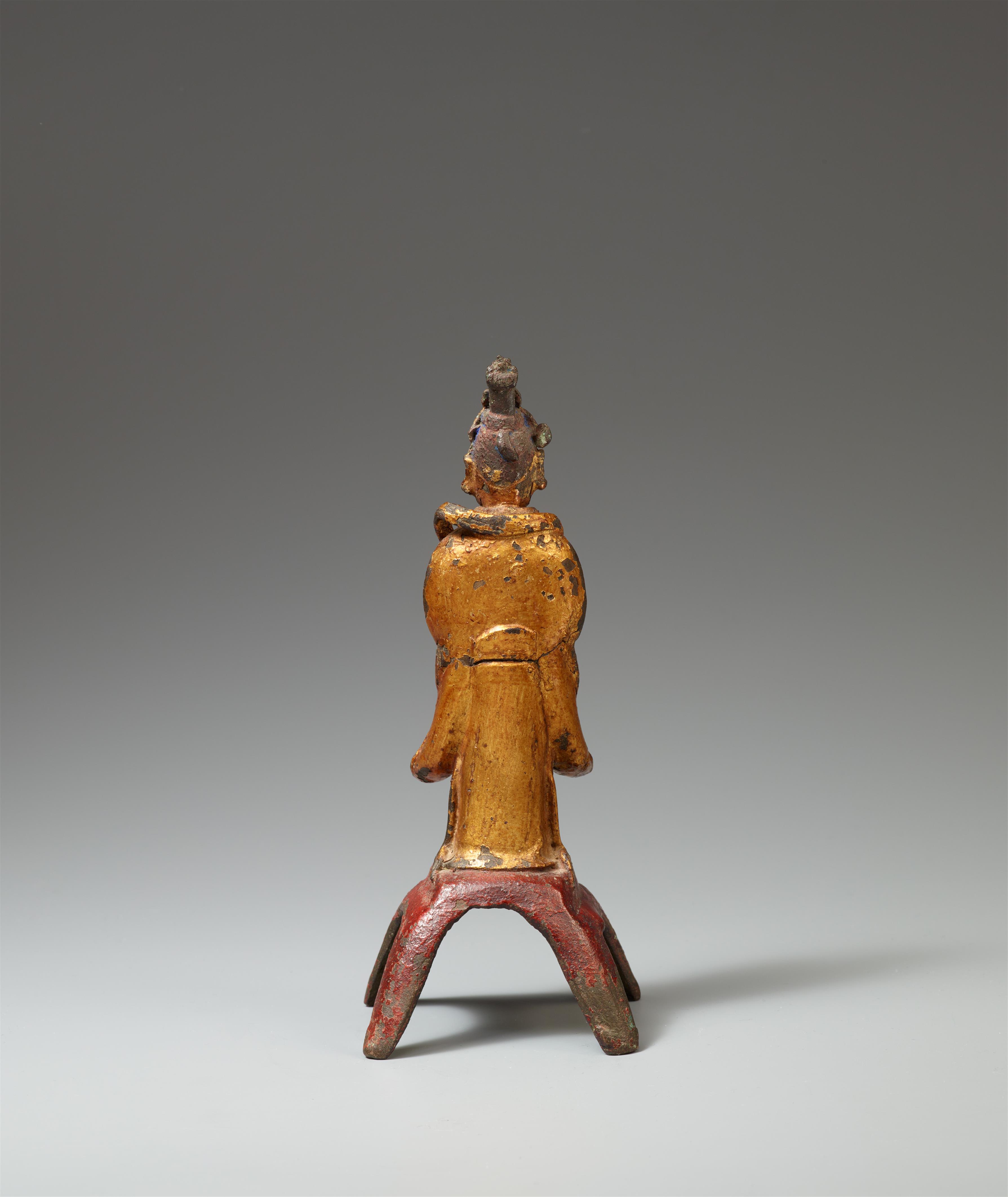 A lacquered and gilt bronze figure of a female attendant. Ming dynasty - image-2