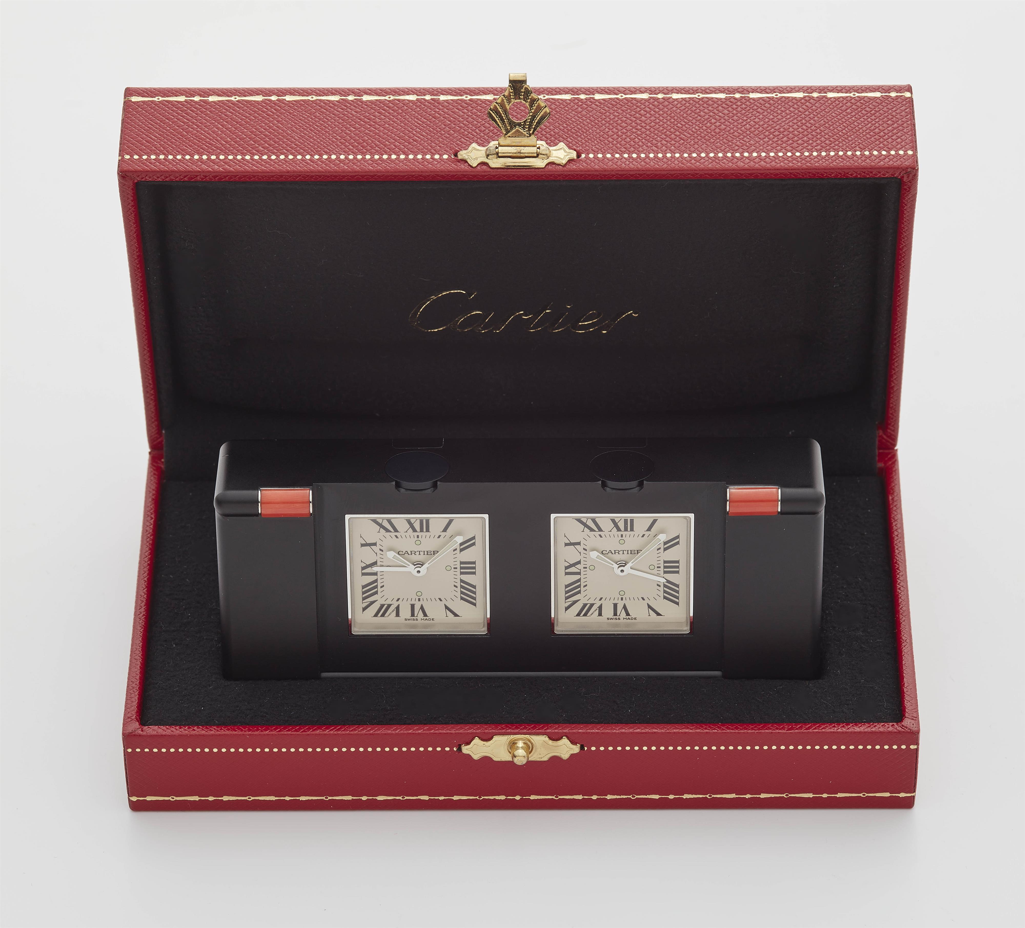 A stainless steel and coral Cartier two time zone travel alarm clock. - image-3