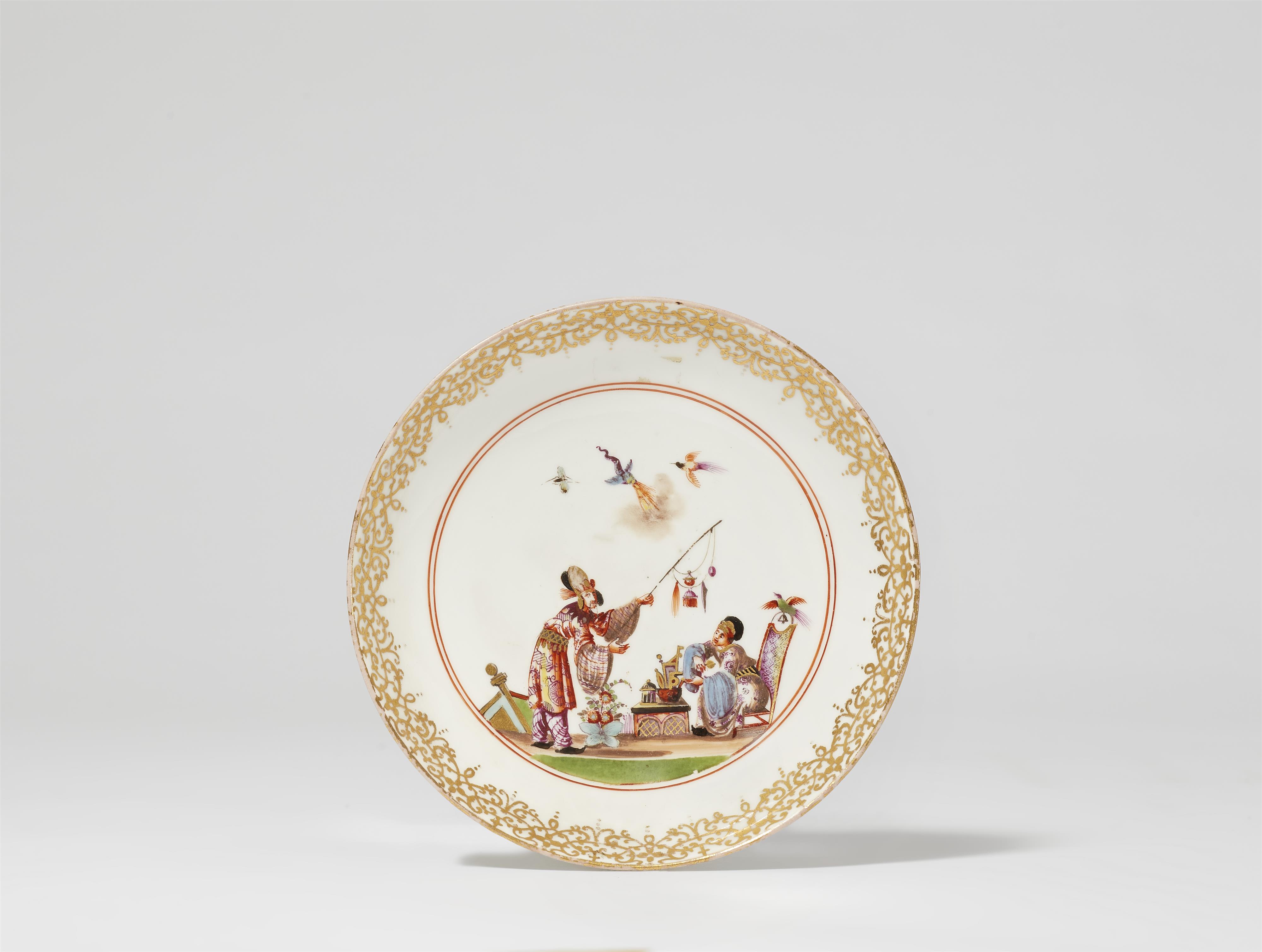 A Meissen porcelain tea bowl and saucer with Hoeroldt Chinoiseries - image-2