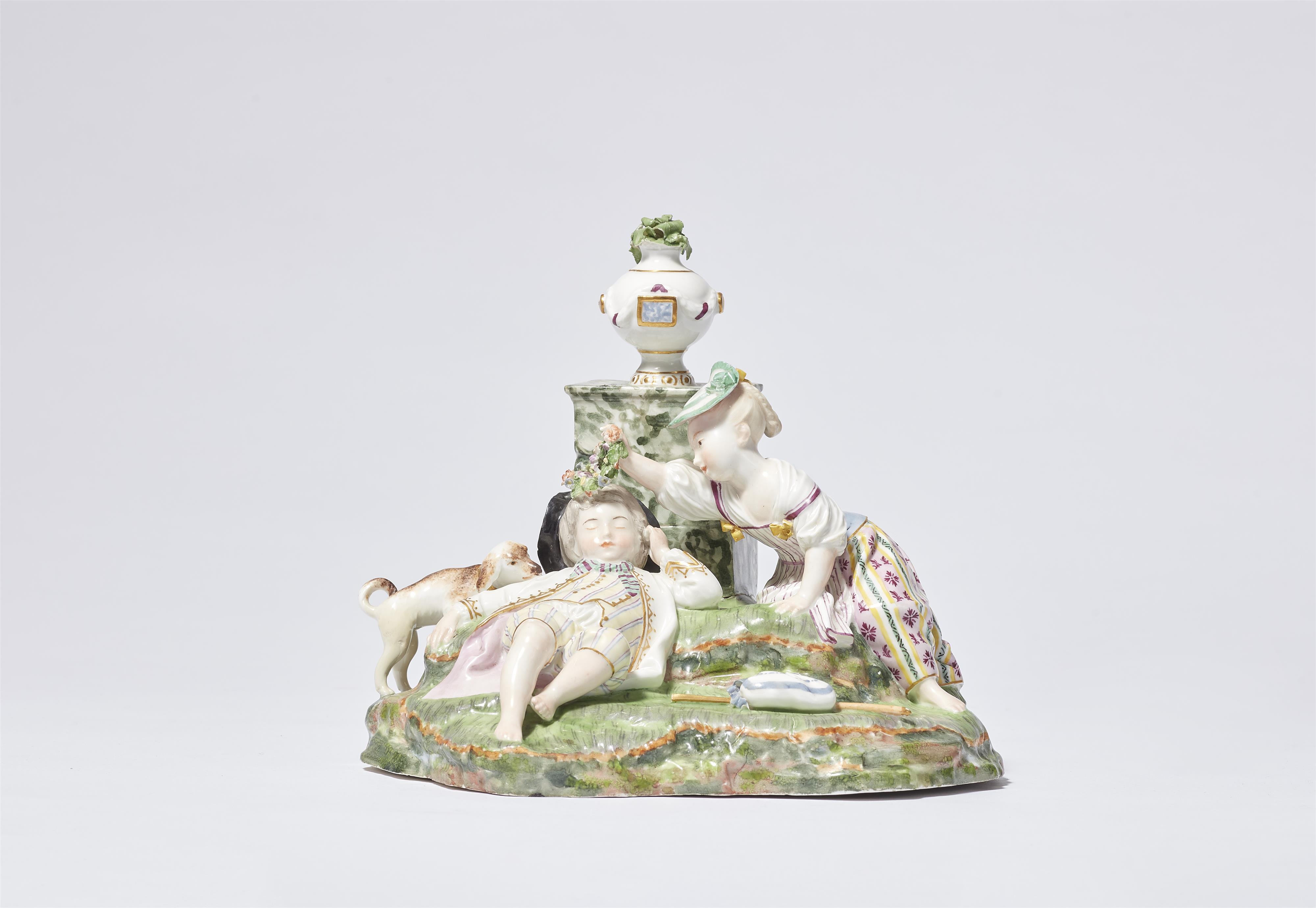 A Höchst porcelain group with a sleeping child - image-1