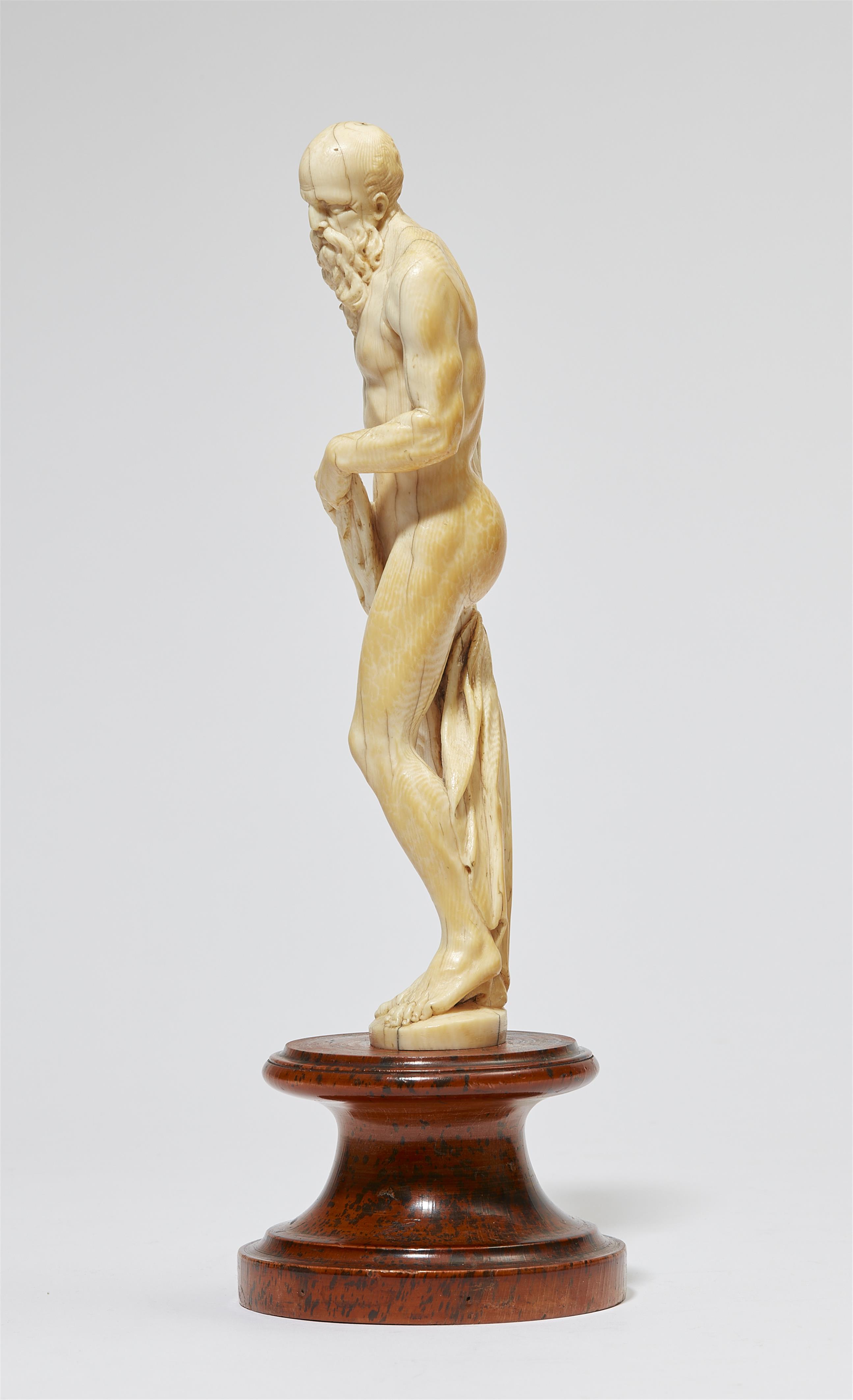 An ivory figure of an old man as Saturn - image-2