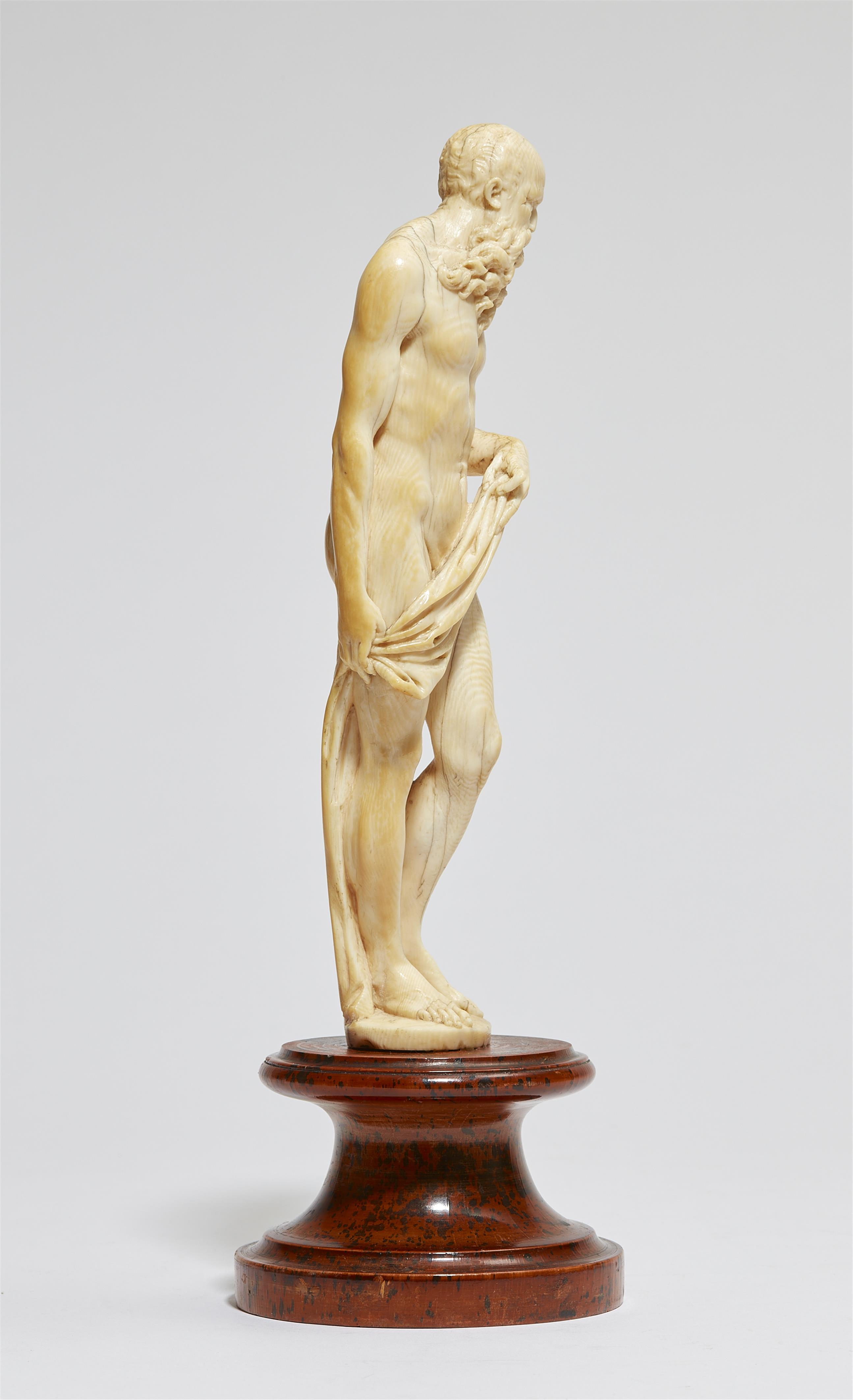 An ivory figure of an old man as Saturn - image-4