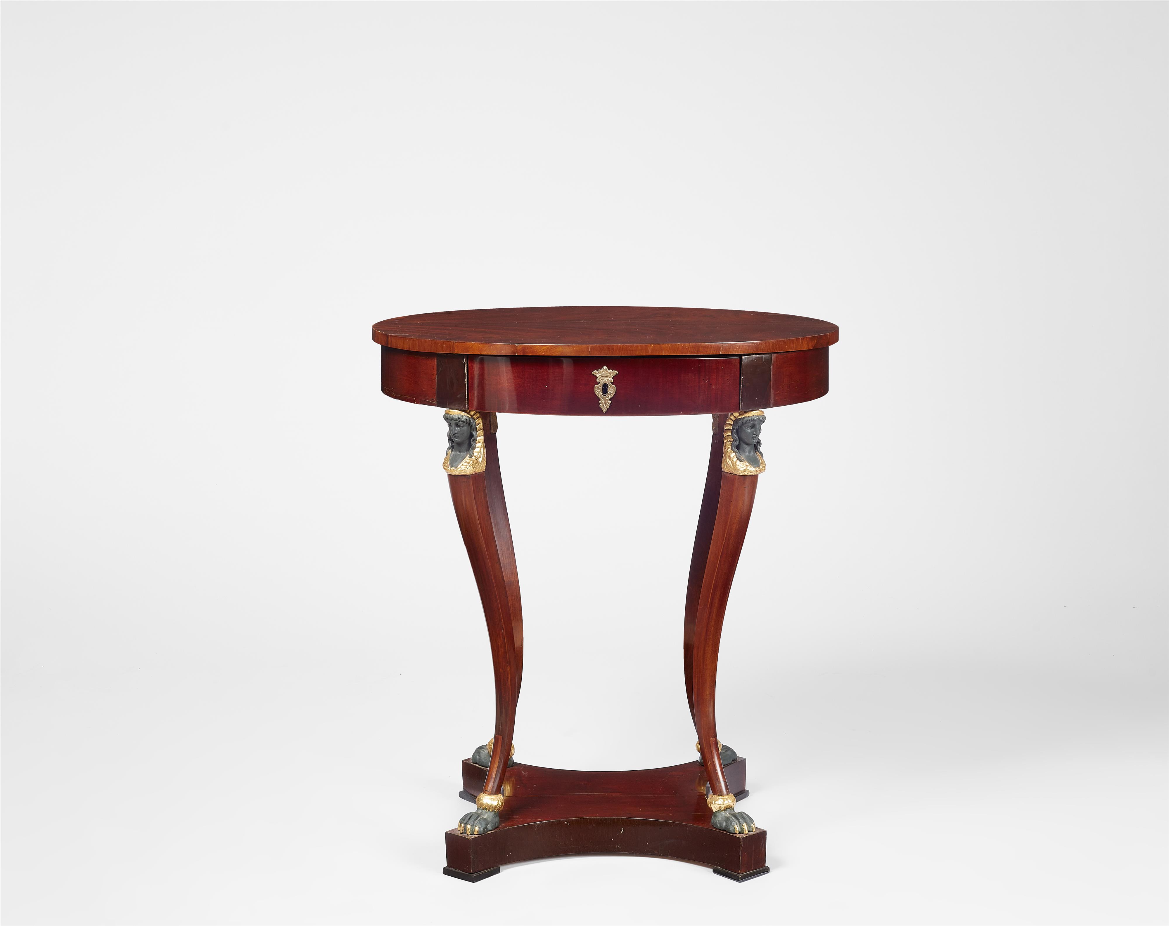 A Vienna Biedermeier mahogany table - image-1
