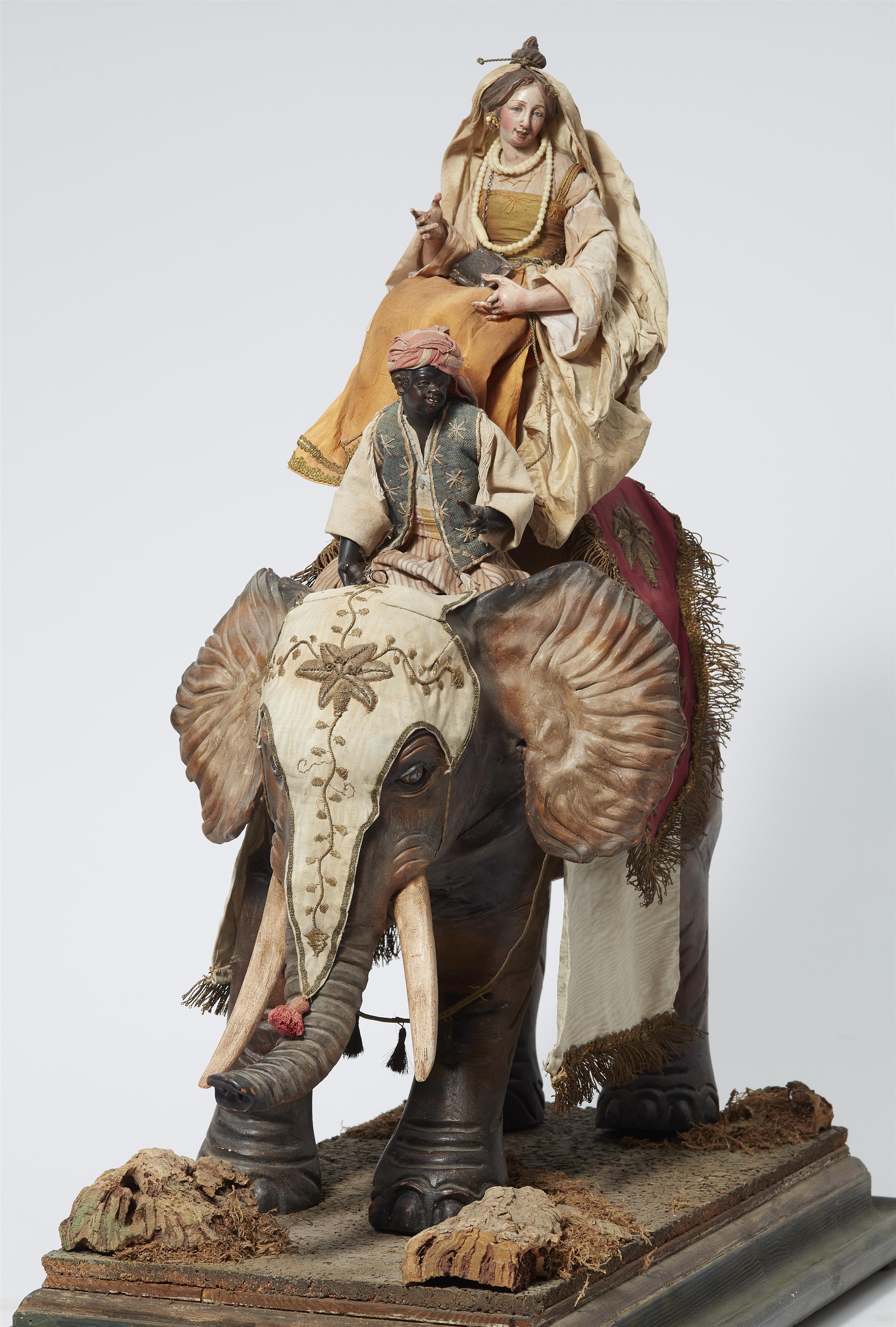 An elephant with a Mahout and Maharani - image-1