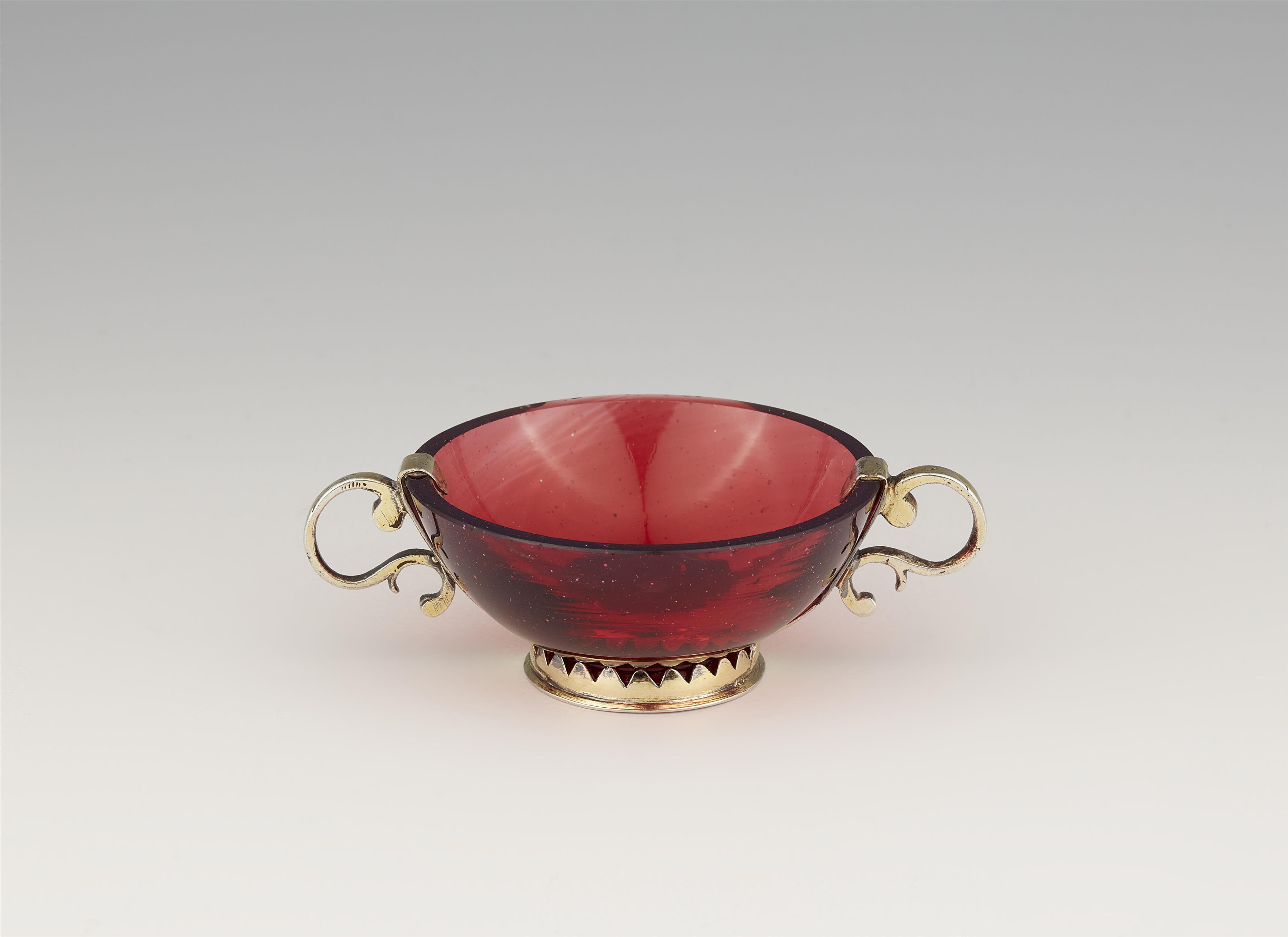 A small Augsburg silver gilt mounted ruby glass dish - image-1
