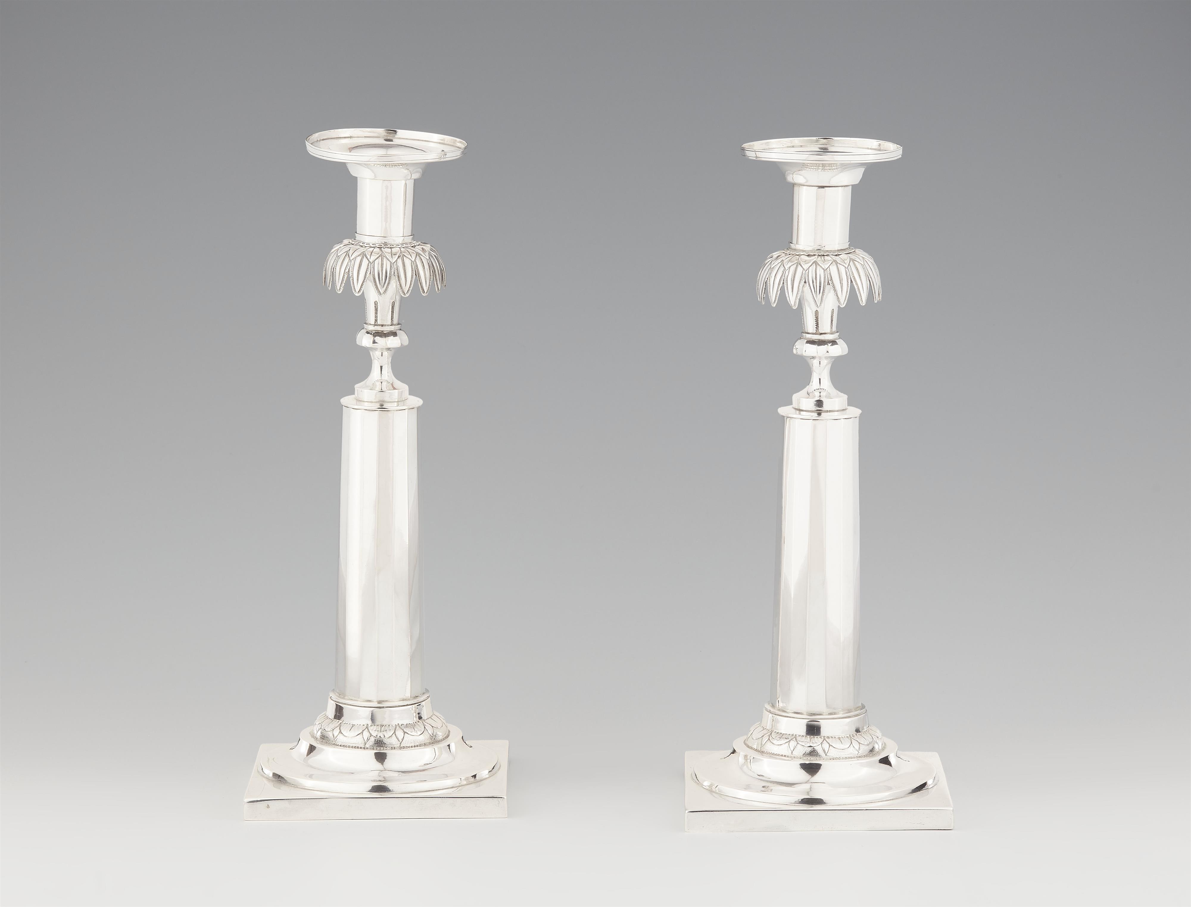 A pair of Neoclassical Augsburg silver candlesticks - image-1