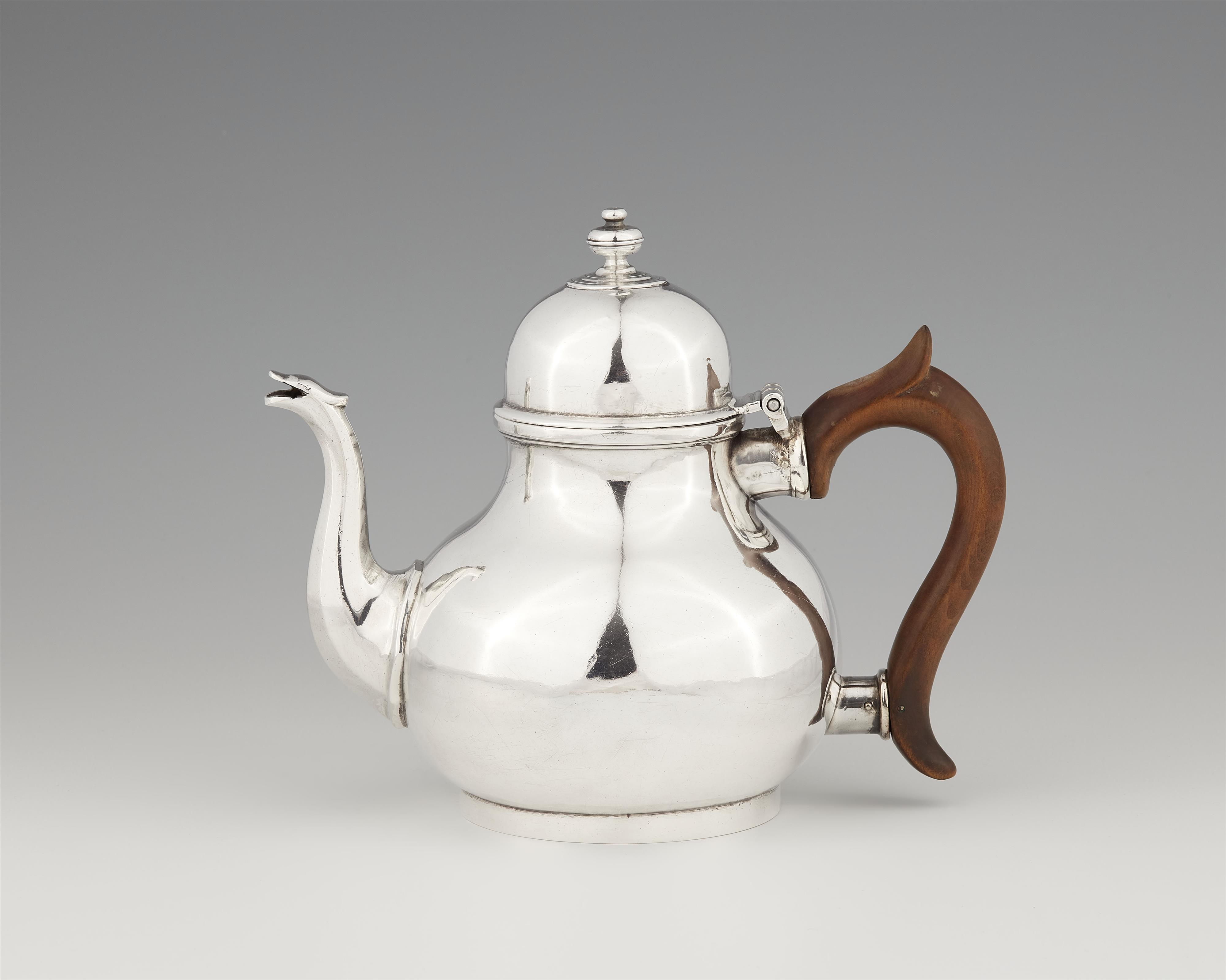 A George I London silver teapot - image-1