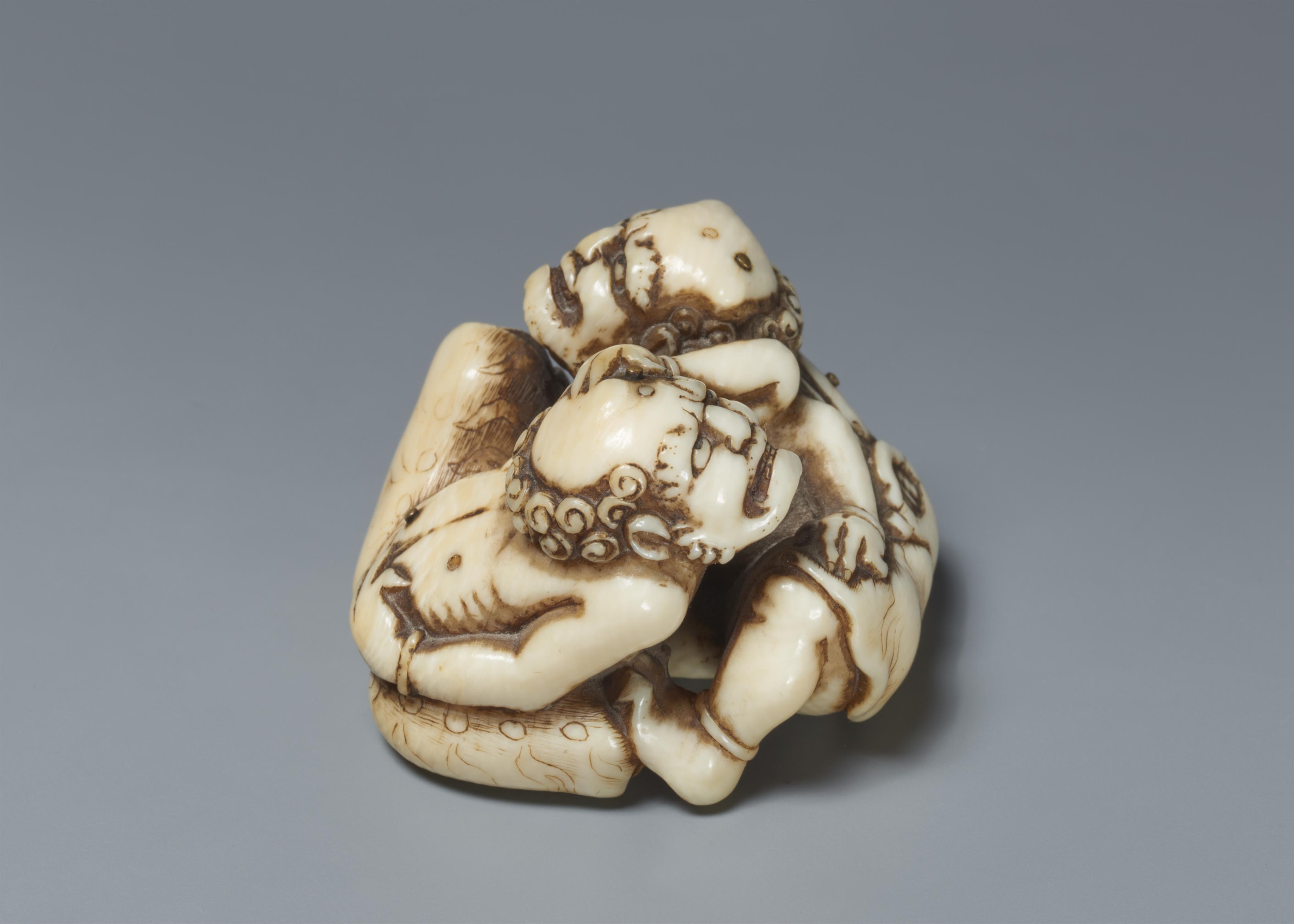 An ivory netsuke of two grumpy oni. Mid-19th century - image-3