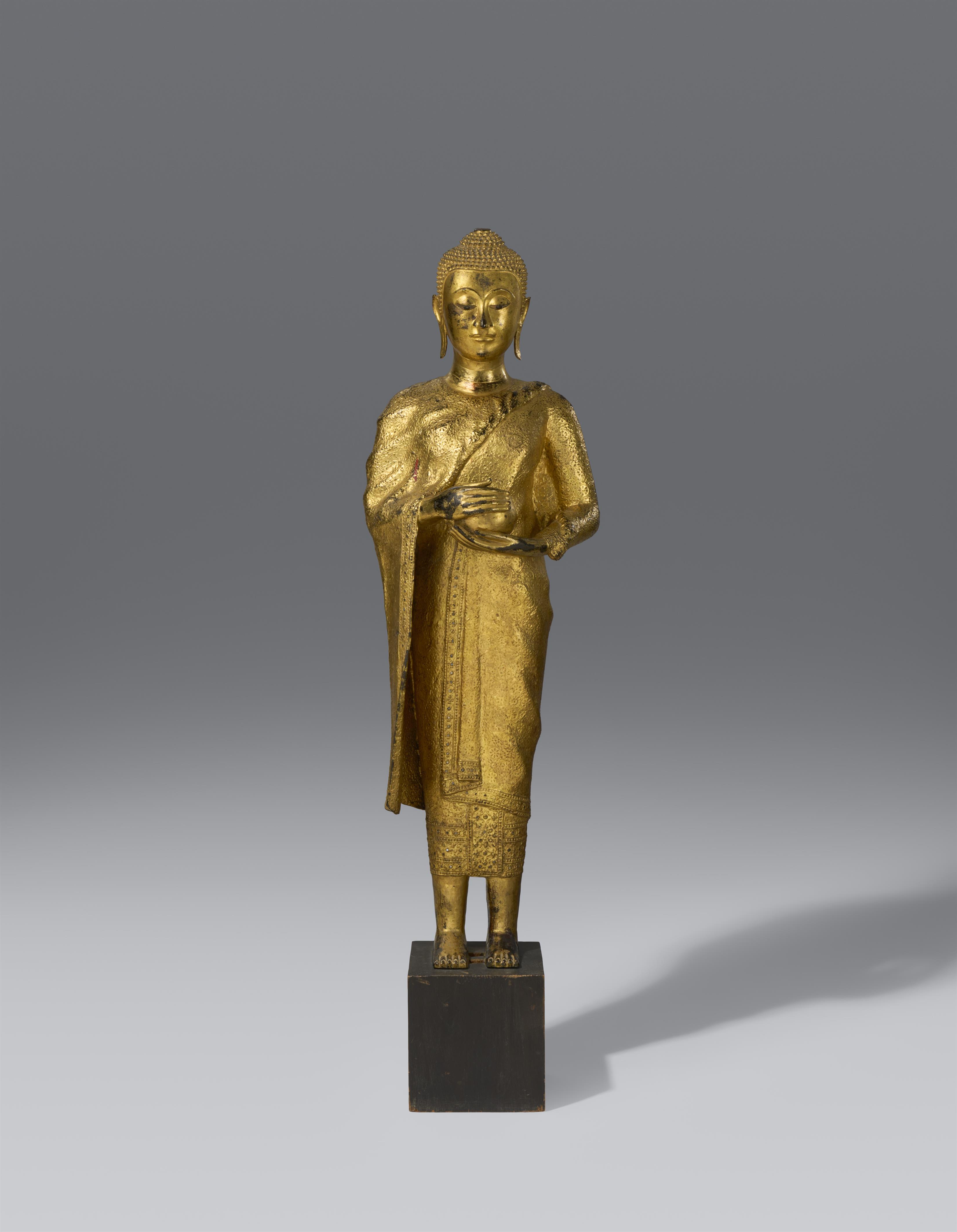 A Ratanakosin gilt and lacquered bronze figure of a Buddha. Thailand. 20th century - image-1