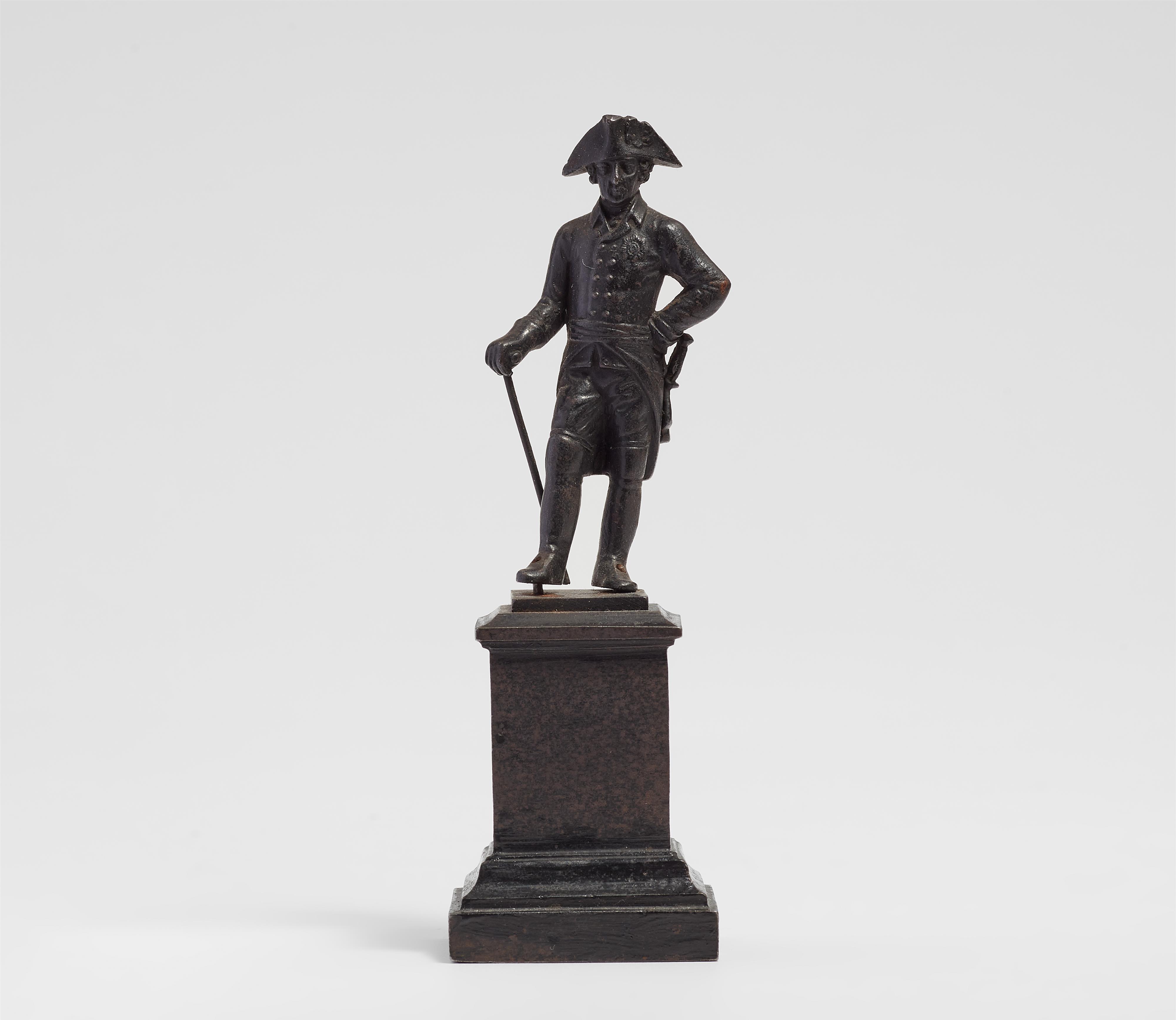 A cast iron miniature statuette of King Frederick II - image-1