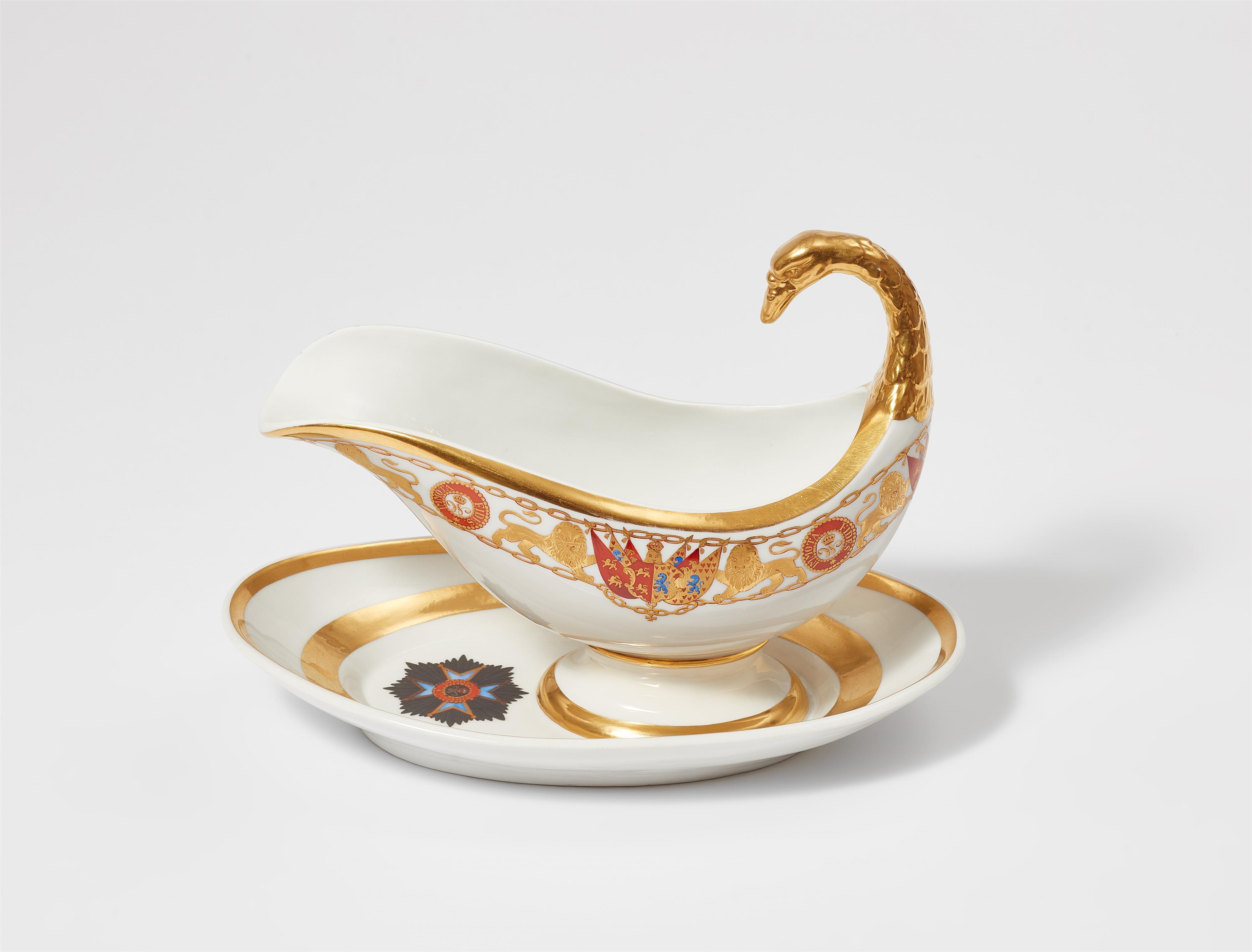 A Berlin KPM porcelain sauce boat from the dinner service with the order of Henry the Lion - image-1