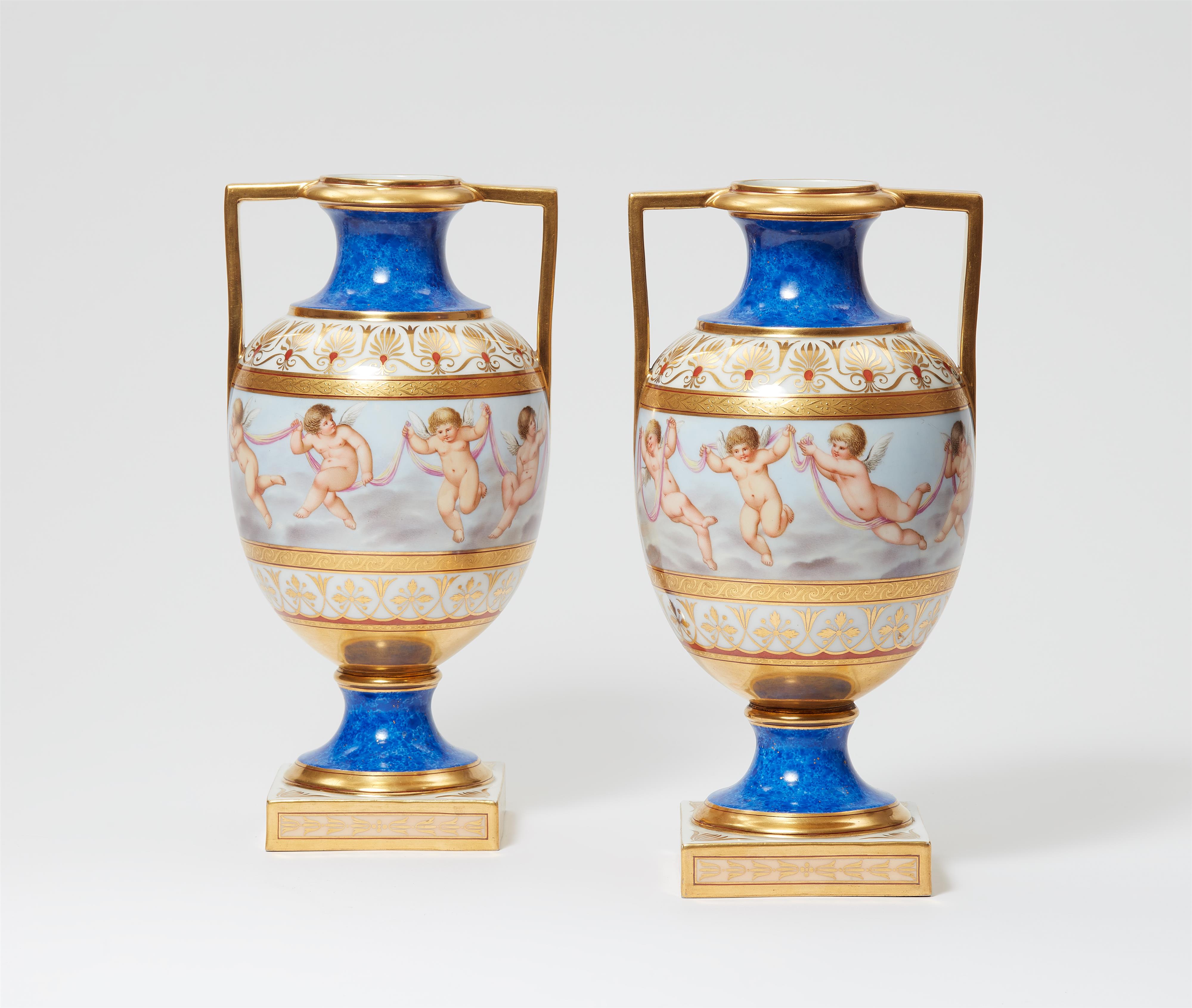 A pair of Berlin KPM porcelain vases with amoretti - image-2
